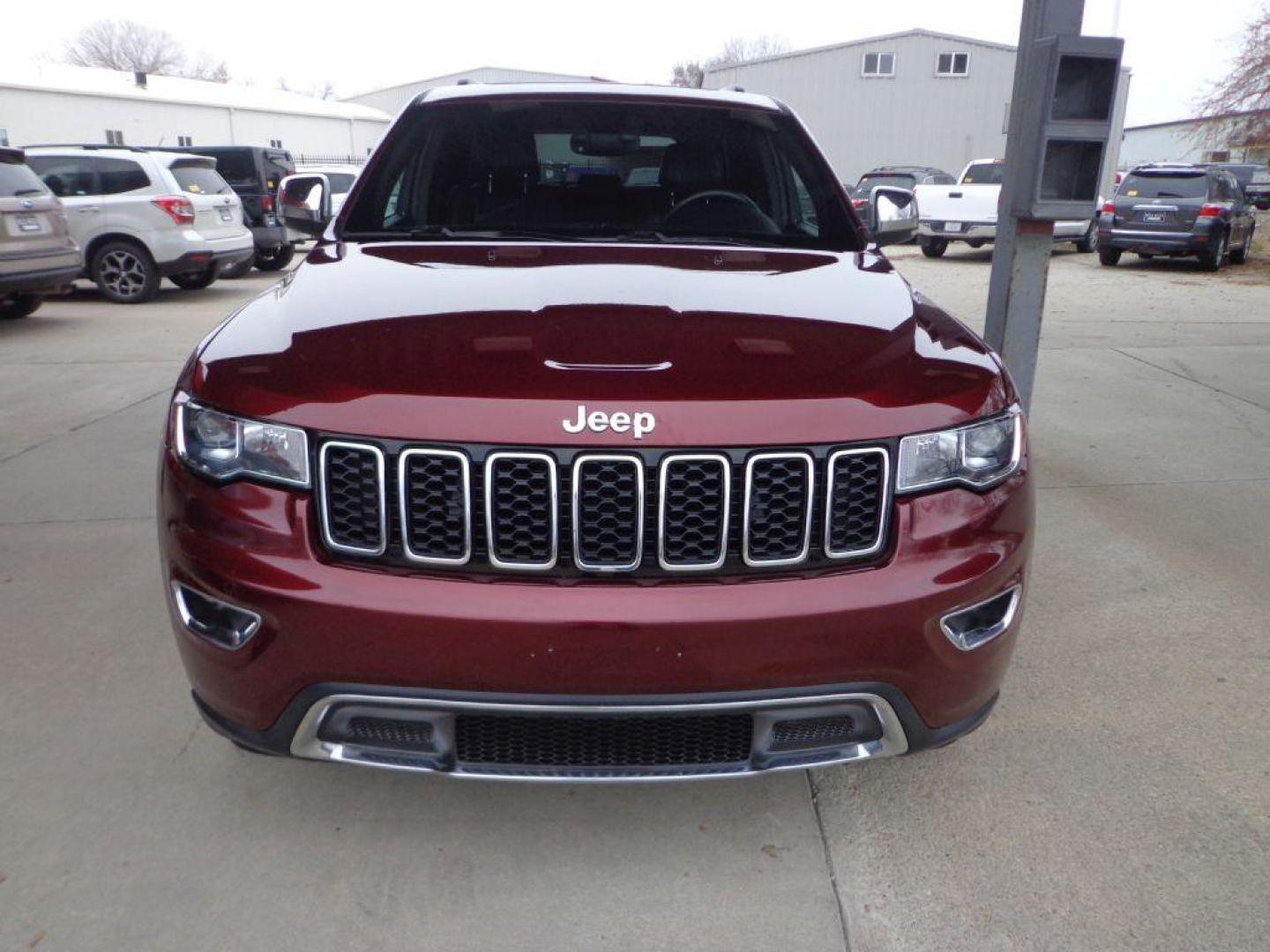 2017 MAROON JEEP GRAND CHEROKEE LIMITED (1C4RJFBGXHC) with an 3.6L engine, Automatic transmission, located at 6610 L St., Omaha, NE, 68117, (402) 731-7800, 41.212872, -96.014702 - THIS VEHICLE HAS A CLEAN TITLE WITH A FREE CARFAX PROVIDED! SHARP LIMITED PACKAGE WITH A CLEAN CARFAX, LOW MILEAGE, SUNROOF, NAV, BLIND SPOT ASSIST, HEATED SEATS/WHEEL AND A NICE SET OF MICHELINS! *****We have found that most customers do the majority of their shopping online before visiting a d - Photo#1