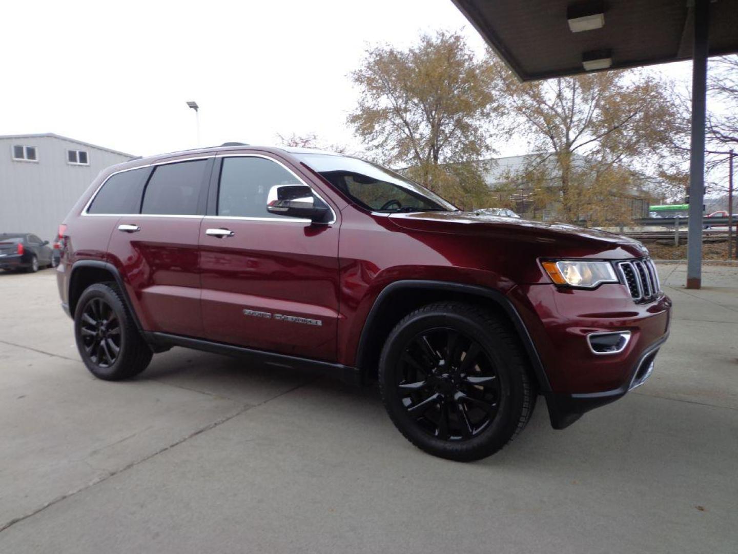 2017 MAROON JEEP GRAND CHEROKEE LIMITED (1C4RJFBGXHC) with an 3.6L engine, Automatic transmission, located at 6610 L St., Omaha, NE, 68117, (402) 731-7800, 41.212872, -96.014702 - THIS VEHICLE HAS A CLEAN TITLE WITH A FREE CARFAX PROVIDED! SHARP LIMITED PACKAGE WITH A CLEAN CARFAX, LOW MILEAGE, SUNROOF, NAV, BLIND SPOT ASSIST, HEATED SEATS/WHEEL AND A NICE SET OF MICHELINS! *****We have found that most customers do the majority of their shopping online before visiting a d - Photo#2