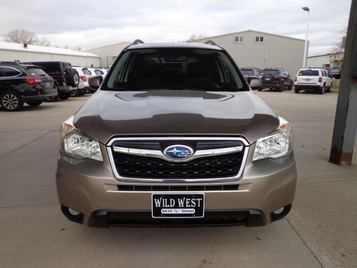 2015 TAN SUBARU FORESTER 2.5I LIMITED (JF2SJAHCXFH) with an 2.5L engine, Automatic transmission, located at 6610 L St., Omaha, NE, 68117, (402) 731-7800, 41.212872, -96.014702 - THIS VEHICLE HAS A CLEAN TITLE WITH A FREE CARFAX PROVIDED! 1-OWNER, CLEAN CARFAX, HEATED SEATS, BACKUP CAM AND SUNROOF. *****We have found that most customers do the majority of their shopping online before visiting a dealership. For this reason we feel it necessary to have a competitive price - Photo#1