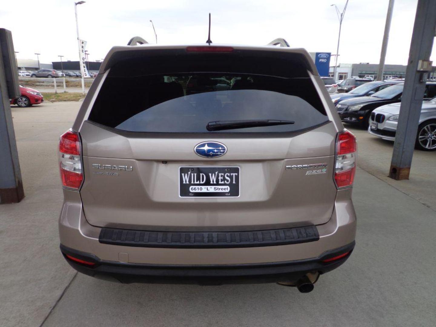 2015 TAN SUBARU FORESTER 2.5I LIMITED (JF2SJAHCXFH) with an 2.5L engine, Automatic transmission, located at 6610 L St., Omaha, NE, 68117, (402) 731-7800, 41.212872, -96.014702 - THIS VEHICLE HAS A CLEAN TITLE WITH A FREE CARFAX PROVIDED! 1-OWNER, CLEAN CARFAX, HEATED SEATS, BACKUP CAM AND SUNROOF. *****We have found that most customers do the majority of their shopping online before visiting a dealership. For this reason we feel it necessary to have a competitive price - Photo#4