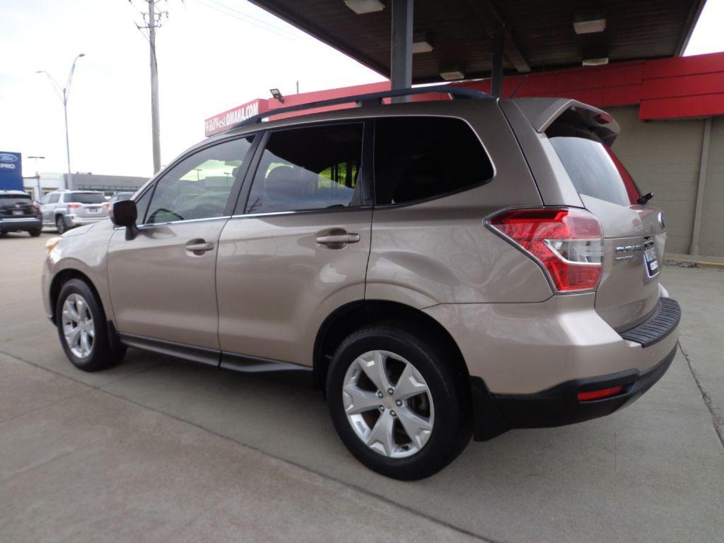 2015 TAN SUBARU FORESTER 2.5I LIMITED (JF2SJAHCXFH) with an 2.5L engine, Automatic transmission, located at 6610 L St., Omaha, NE, 68117, (402) 731-7800, 41.212872, -96.014702 - THIS VEHICLE HAS A CLEAN TITLE WITH A FREE CARFAX PROVIDED! 1-OWNER, CLEAN CARFAX, HEATED SEATS, BACKUP CAM AND SUNROOF. *****We have found that most customers do the majority of their shopping online before visiting a dealership. For this reason we feel it necessary to have a competitive price - Photo#5