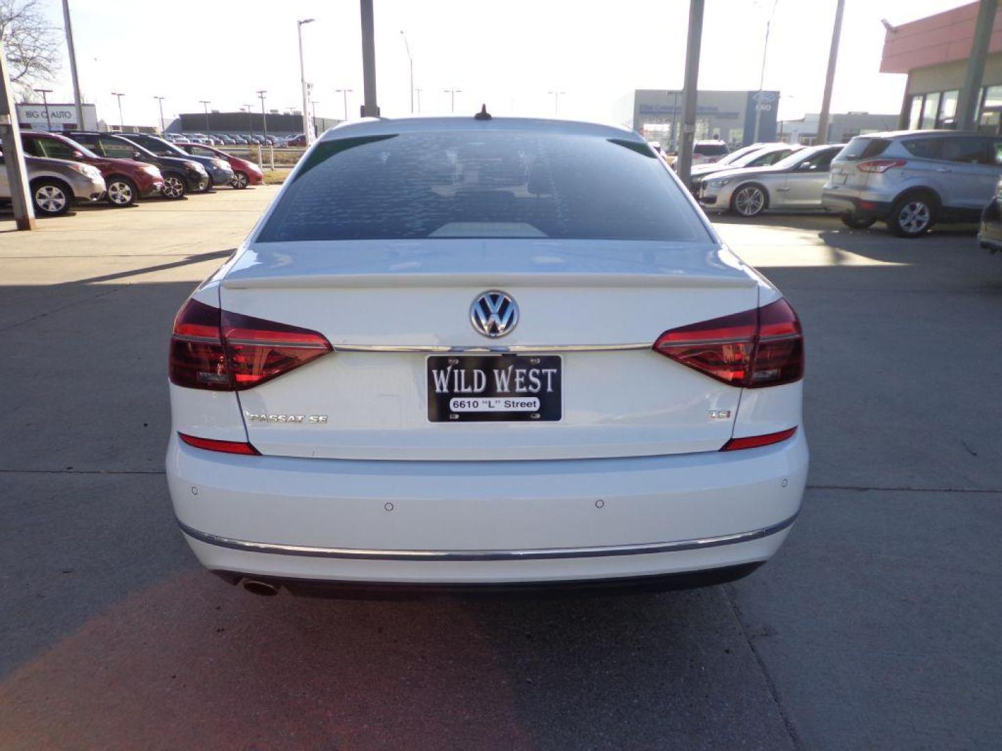 2017 WHITE VOLKSWAGEN PASSAT SE (1VWGT7A30HC) with an 1.8L engine, Automatic transmission, located at 6610 L St., Omaha, NE, 68117, (402) 731-7800, 41.212872, -96.014702 - THIS VEHICLE HAS A CLEAN TITLE WITH A FREE CARFAX PROVIDED! 2-OWNER, CLEAN CARFAX, LOW MILEAGE, SUNROOF, NAV, BACKUP CAM, FRONT AND REAR HEATED SEATS AND NEWER TIRES! *****We have found that most customers do the majority of their shopping online before visiting a dealership. For this reason - Photo#4
