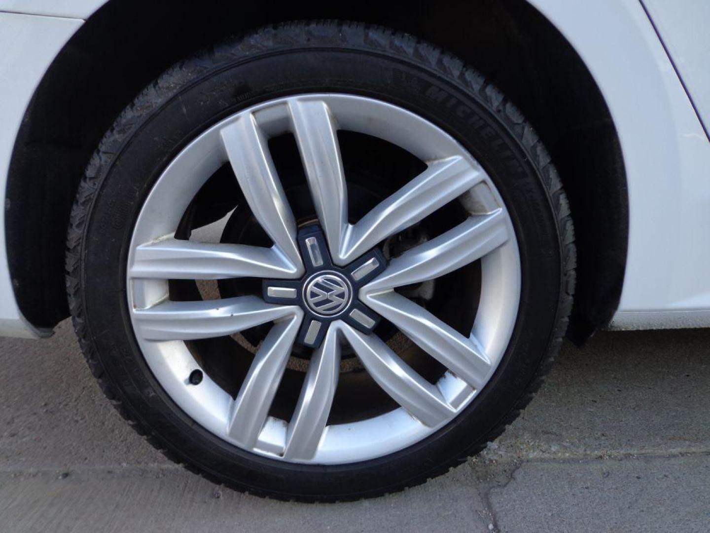 2017 WHITE VOLKSWAGEN PASSAT SE (1VWGT7A30HC) with an 1.8L engine, Automatic transmission, located at 6610 L St., Omaha, NE, 68117, (402) 731-7800, 41.212872, -96.014702 - THIS VEHICLE HAS A CLEAN TITLE WITH A FREE CARFAX PROVIDED! 2-OWNER, CLEAN CARFAX, LOW MILEAGE, SUNROOF, NAV, BACKUP CAM, FRONT AND REAR HEATED SEATS AND NEWER TIRES! *****We have found that most customers do the majority of their shopping online before visiting a dealership. For this reason - Photo#8