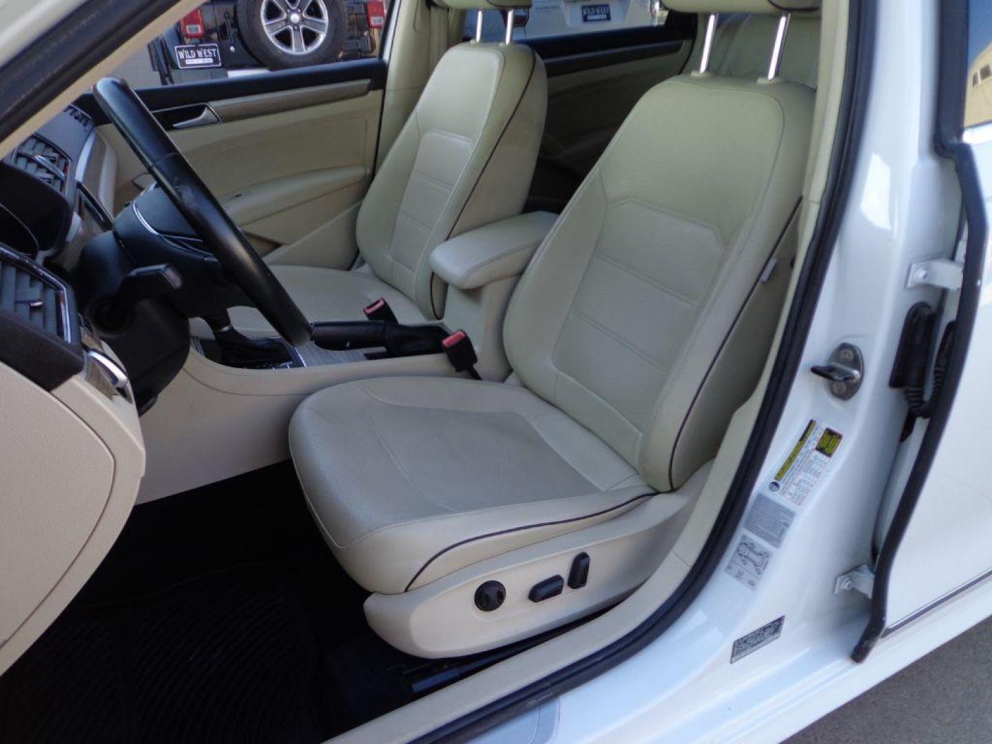 2017 WHITE VOLKSWAGEN PASSAT SE (1VWGT7A30HC) with an 1.8L engine, Automatic transmission, located at 6610 L St., Omaha, NE, 68117, (402) 731-7800, 41.212872, -96.014702 - THIS VEHICLE HAS A CLEAN TITLE WITH A FREE CARFAX PROVIDED! 2-OWNER, CLEAN CARFAX, LOW MILEAGE, SUNROOF, NAV, BACKUP CAM, FRONT AND REAR HEATED SEATS AND NEWER TIRES! *****We have found that most customers do the majority of their shopping online before visiting a dealership. For this reason - Photo#12