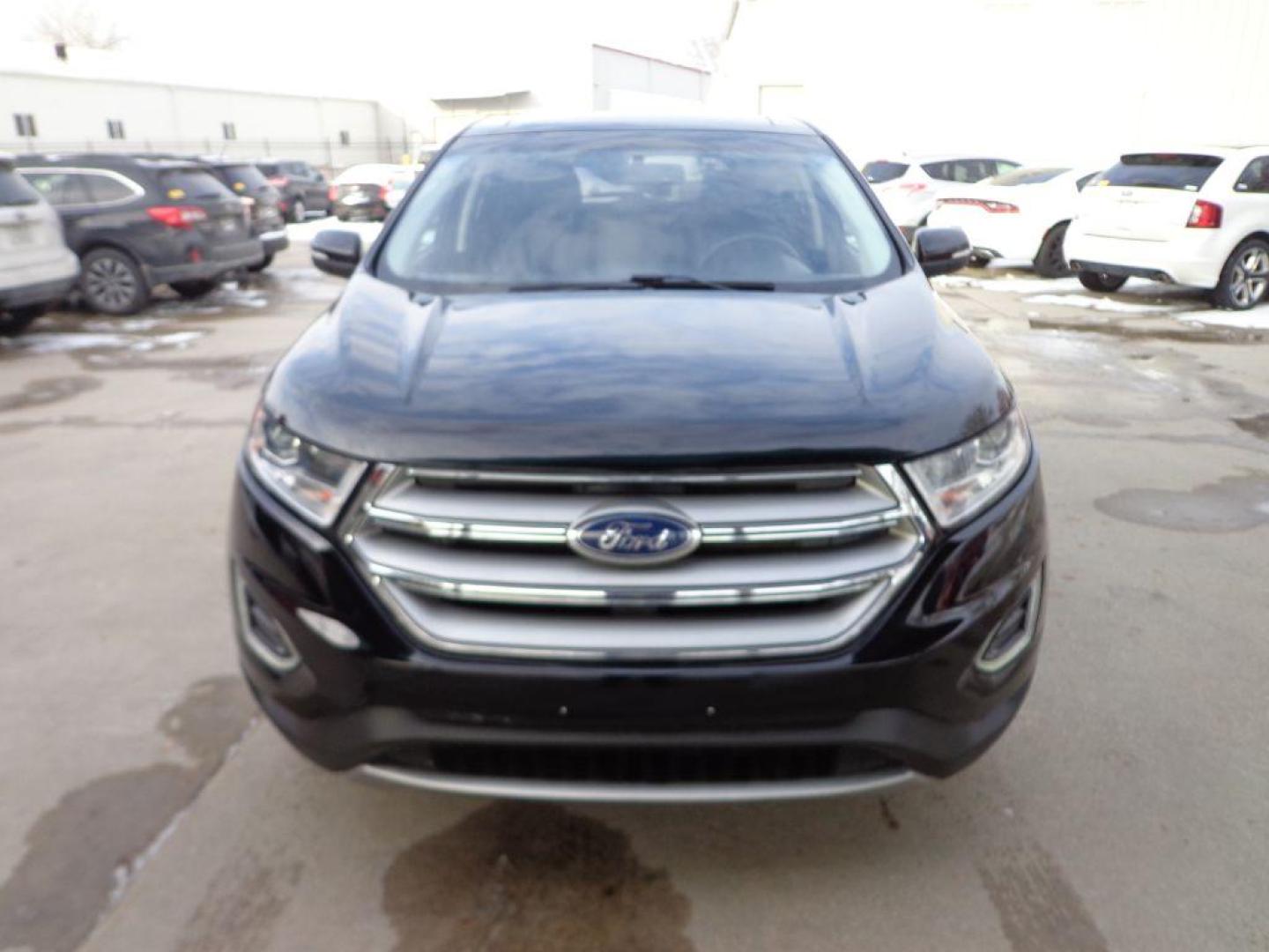 2016 BLACK FORD EDGE TITANIUM (2FMPK4K84GB) with an 3.5L engine, Automatic transmission, located at 6610 L St., Omaha, NE, 68117, (402) 731-7800, 41.212872, -96.014702 - THIS VEHICLE HAS A BEEN FULLY INSPECTED AND HAS A CLEAN TITLE WITH A FREE CARFAX REPORT PROVIDED! 2-OWNER, CLEAN CARFAX, LOW MILEAGE, PANORAMIC ROOF, NAVIGATION AND NEWER TIRES! *****We have found that most customers do the majority of their shopping online before visiting a ealership. For this - Photo#1