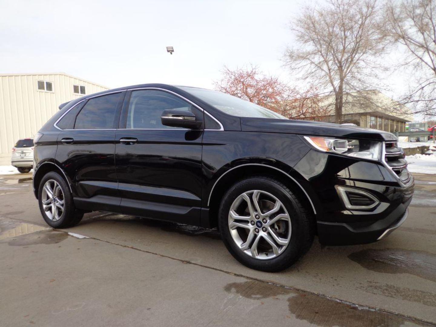 2016 BLACK FORD EDGE TITANIUM (2FMPK4K84GB) with an 3.5L engine, Automatic transmission, located at 6610 L St., Omaha, NE, 68117, (402) 731-7800, 41.212872, -96.014702 - THIS VEHICLE HAS A BEEN FULLY INSPECTED AND HAS A CLEAN TITLE WITH A FREE CARFAX REPORT PROVIDED! 2-OWNER, CLEAN CARFAX, LOW MILEAGE, PANORAMIC ROOF, NAVIGATION AND NEWER TIRES! *****We have found that most customers do the majority of their shopping online before visiting a ealership. For this - Photo#2