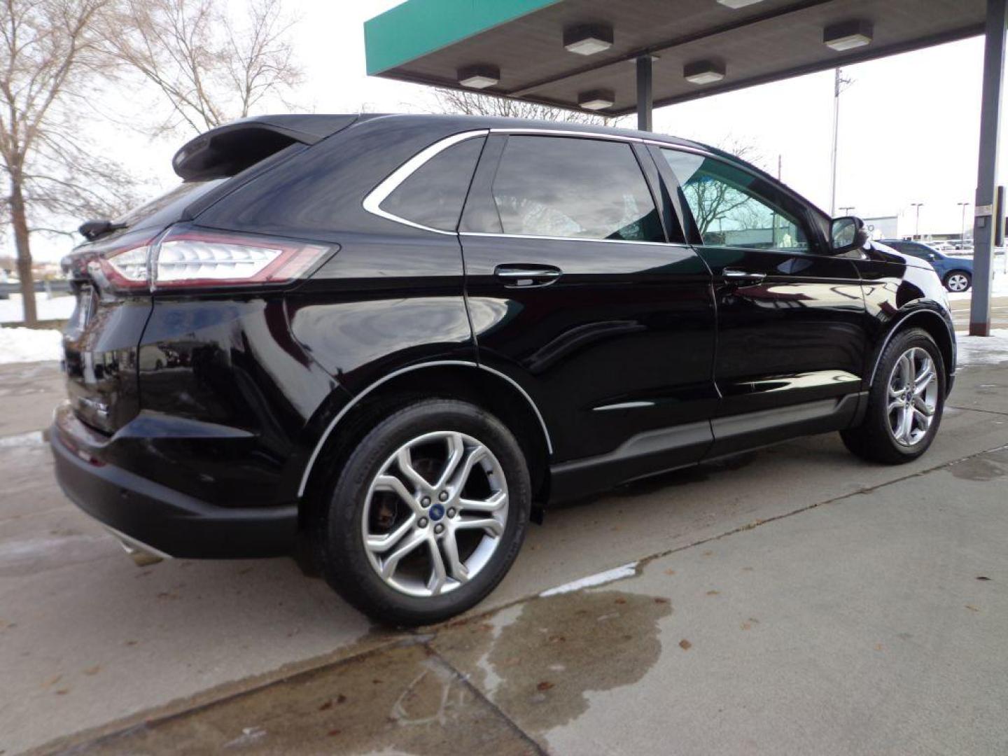 2016 BLACK FORD EDGE TITANIUM (2FMPK4K84GB) with an 3.5L engine, Automatic transmission, located at 6610 L St., Omaha, NE, 68117, (402) 731-7800, 41.212872, -96.014702 - THIS VEHICLE HAS A BEEN FULLY INSPECTED AND HAS A CLEAN TITLE WITH A FREE CARFAX REPORT PROVIDED! 2-OWNER, CLEAN CARFAX, LOW MILEAGE, PANORAMIC ROOF, NAVIGATION AND NEWER TIRES! *****We have found that most customers do the majority of their shopping online before visiting a ealership. For this - Photo#3