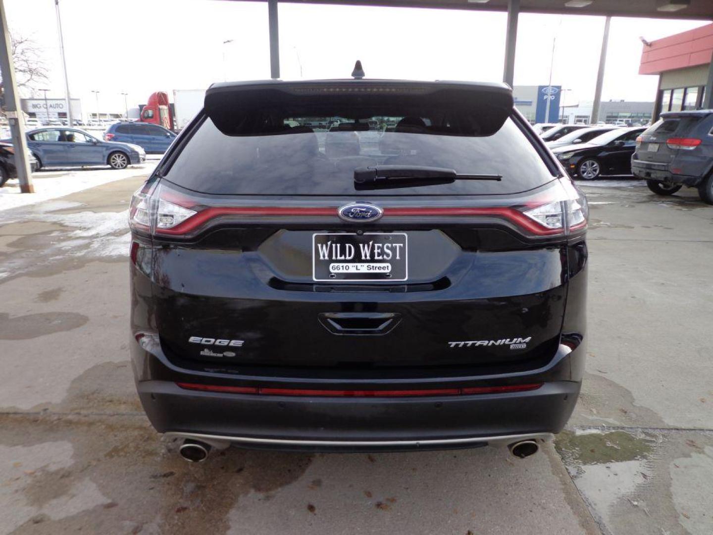 2016 BLACK FORD EDGE TITANIUM (2FMPK4K84GB) with an 3.5L engine, Automatic transmission, located at 6610 L St., Omaha, NE, 68117, (402) 731-7800, 41.212872, -96.014702 - THIS VEHICLE HAS A BEEN FULLY INSPECTED AND HAS A CLEAN TITLE WITH A FREE CARFAX REPORT PROVIDED! 2-OWNER, CLEAN CARFAX, LOW MILEAGE, PANORAMIC ROOF, NAVIGATION AND NEWER TIRES! *****We have found that most customers do the majority of their shopping online before visiting a ealership. For this - Photo#4