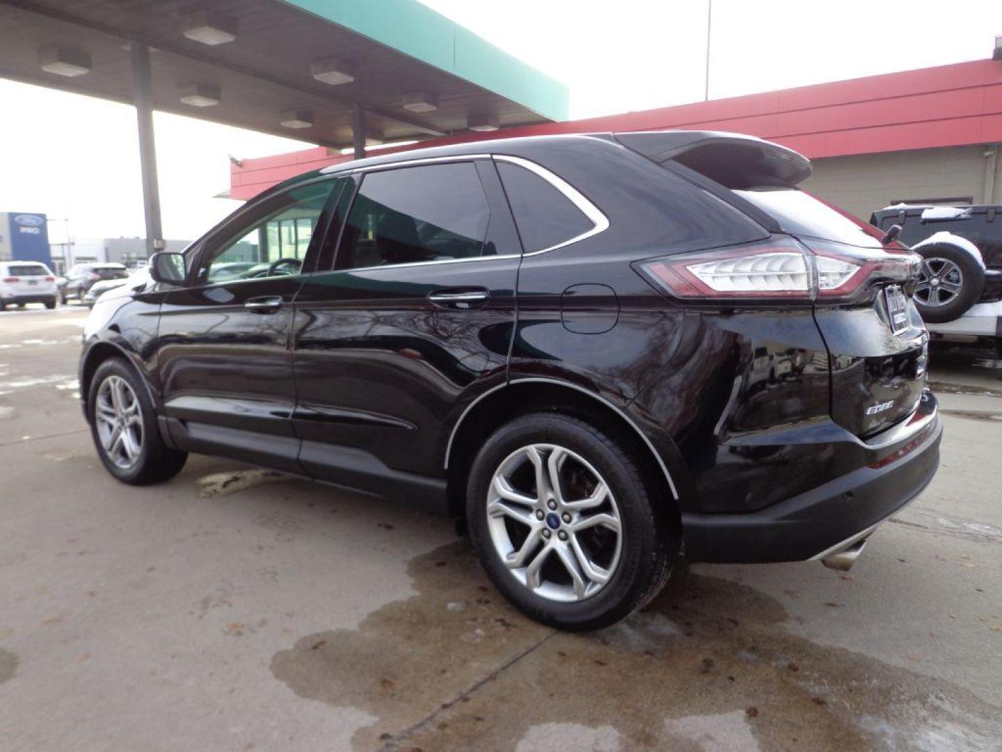2016 BLACK FORD EDGE TITANIUM (2FMPK4K84GB) with an 3.5L engine, Automatic transmission, located at 6610 L St., Omaha, NE, 68117, (402) 731-7800, 41.212872, -96.014702 - THIS VEHICLE HAS A BEEN FULLY INSPECTED AND HAS A CLEAN TITLE WITH A FREE CARFAX REPORT PROVIDED! 2-OWNER, CLEAN CARFAX, LOW MILEAGE, PANORAMIC ROOF, NAVIGATION AND NEWER TIRES! *****We have found that most customers do the majority of their shopping online before visiting a ealership. For this - Photo#5