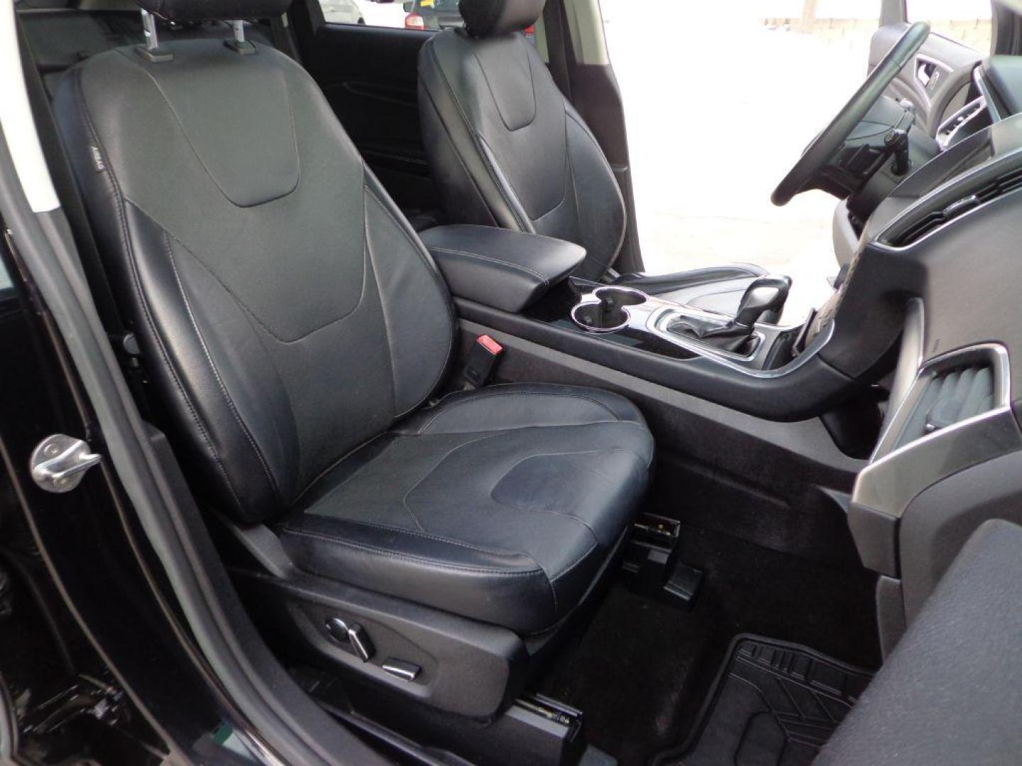 2016 BLACK FORD EDGE TITANIUM (2FMPK4K84GB) with an 3.5L engine, Automatic transmission, located at 6610 L St., Omaha, NE, 68117, (402) 731-7800, 41.212872, -96.014702 - THIS VEHICLE HAS A BEEN FULLY INSPECTED AND HAS A CLEAN TITLE WITH A FREE CARFAX REPORT PROVIDED! 2-OWNER, CLEAN CARFAX, LOW MILEAGE, PANORAMIC ROOF, NAVIGATION AND NEWER TIRES! *****We have found that most customers do the majority of their shopping online before visiting a ealership. For this - Photo#16