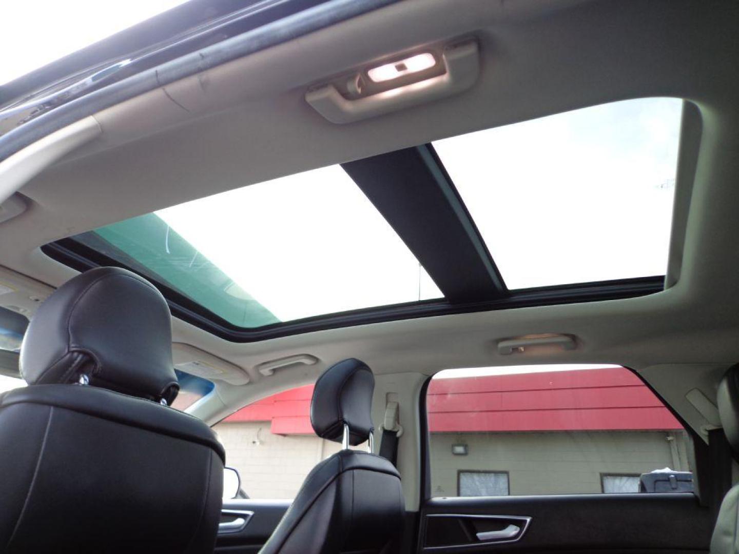 2016 BLACK FORD EDGE TITANIUM (2FMPK4K84GB) with an 3.5L engine, Automatic transmission, located at 6610 L St., Omaha, NE, 68117, (402) 731-7800, 41.212872, -96.014702 - THIS VEHICLE HAS A BEEN FULLY INSPECTED AND HAS A CLEAN TITLE WITH A FREE CARFAX REPORT PROVIDED! 2-OWNER, CLEAN CARFAX, LOW MILEAGE, PANORAMIC ROOF, NAVIGATION AND NEWER TIRES! *****We have found that most customers do the majority of their shopping online before visiting a ealership. For this - Photo#20