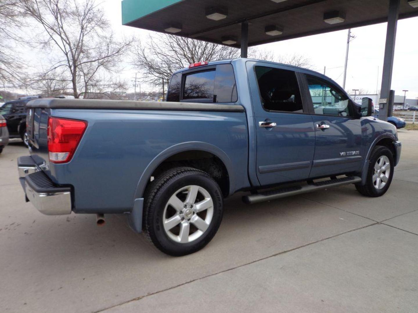 2011 BLUE NISSAN TITAN SL (1N6AA0EC3BN) with an 5.6L engine, Automatic transmission, located at 6610 L St., Omaha, NE, 68117, (402) 731-7800, 41.212872, -96.014702 - THIS VEHICLE HAS A CLEAN TITLE WITH A FREE CARFAX PROVIDED! 2-OWNER, CLEAN CARFAX, LOW MILEAGE, RUST-FREE, HEATED LEATHER, PREMIUM AUDIO AND NEWER TIRES! *****We have found that most customers do the majority of their shopping online before visiting a dealership. For this reason we feel it nec - Photo#3