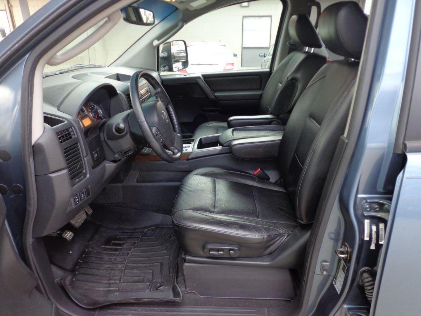 2011 BLUE NISSAN TITAN SL (1N6AA0EC3BN) with an 5.6L engine, Automatic transmission, located at 6610 L St., Omaha, NE, 68117, (402) 731-7800, 41.212872, -96.014702 - THIS VEHICLE HAS A CLEAN TITLE WITH A FREE CARFAX PROVIDED! 2-OWNER, CLEAN CARFAX, LOW MILEAGE, RUST-FREE, HEATED LEATHER, PREMIUM AUDIO AND NEWER TIRES! *****We have found that most customers do the majority of their shopping online before visiting a dealership. For this reason we feel it nec - Photo#12