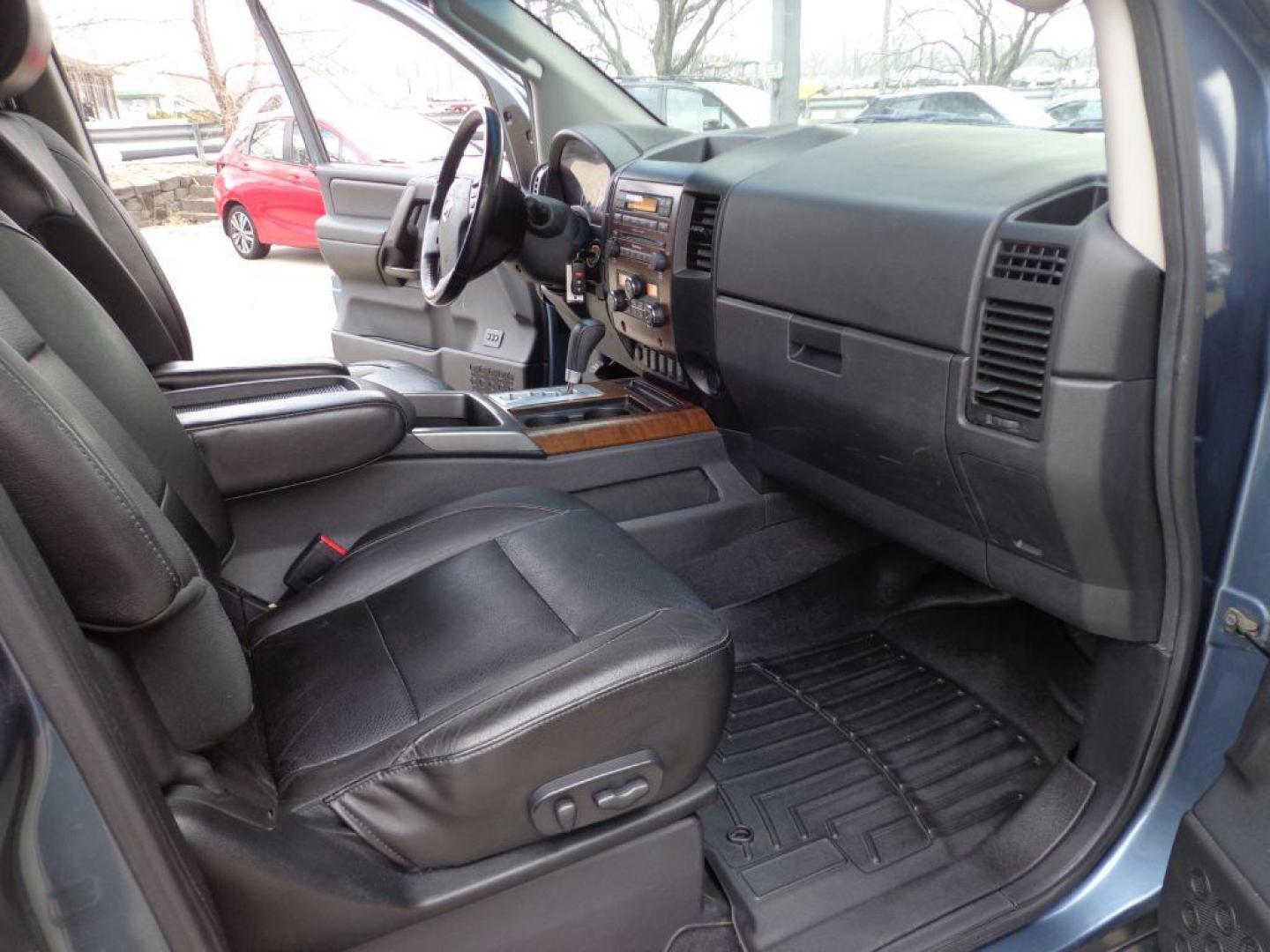 2011 BLUE NISSAN TITAN SL (1N6AA0EC3BN) with an 5.6L engine, Automatic transmission, located at 6610 L St., Omaha, NE, 68117, (402) 731-7800, 41.212872, -96.014702 - THIS VEHICLE HAS A CLEAN TITLE WITH A FREE CARFAX PROVIDED! 2-OWNER, CLEAN CARFAX, LOW MILEAGE, RUST-FREE, HEATED LEATHER, PREMIUM AUDIO AND NEWER TIRES! *****We have found that most customers do the majority of their shopping online before visiting a dealership. For this reason we feel it nec - Photo#17