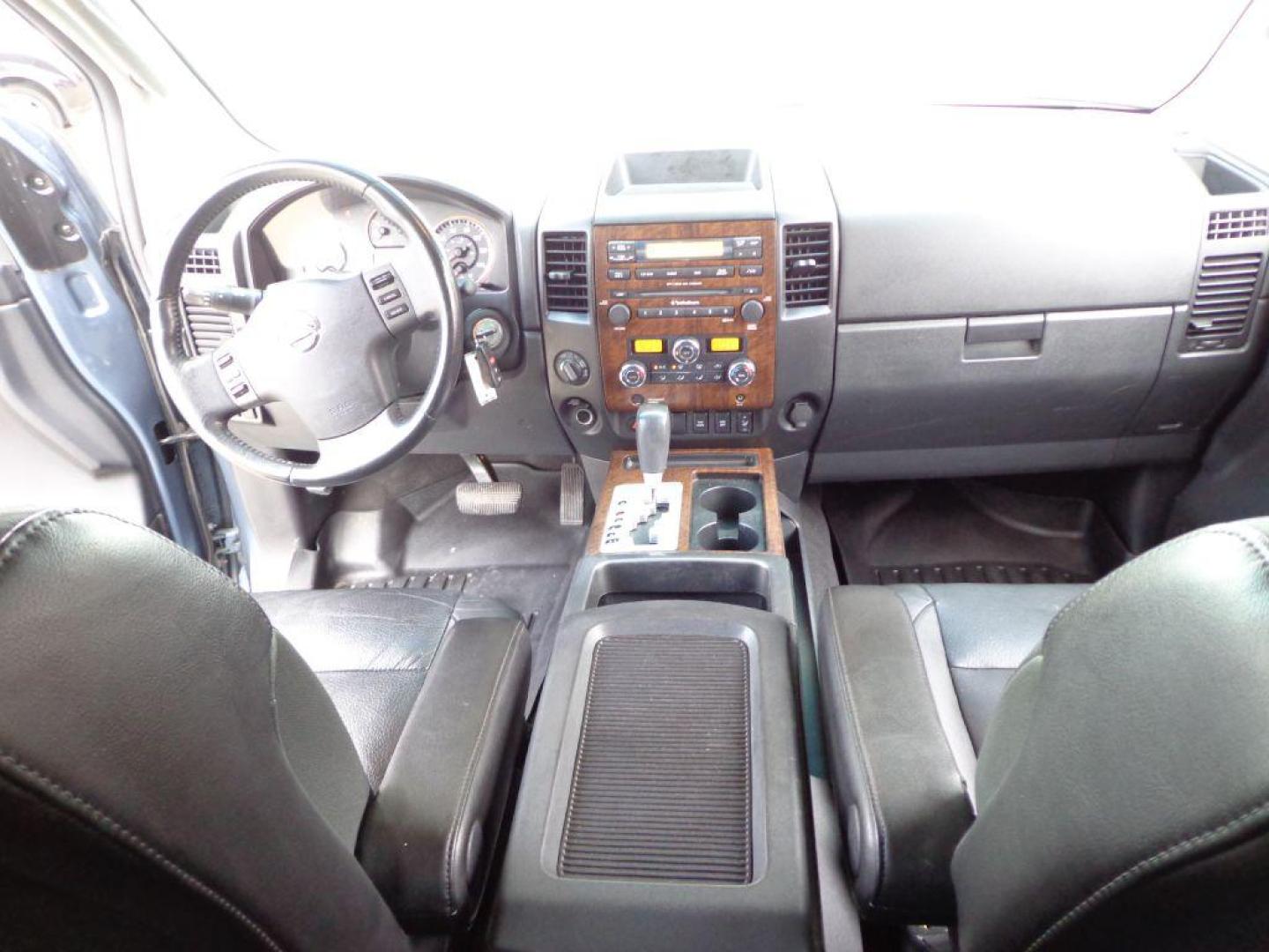 2011 BLUE NISSAN TITAN SL (1N6AA0EC3BN) with an 5.6L engine, Automatic transmission, located at 6610 L St., Omaha, NE, 68117, (402) 731-7800, 41.212872, -96.014702 - THIS VEHICLE HAS A CLEAN TITLE WITH A FREE CARFAX PROVIDED! 2-OWNER, CLEAN CARFAX, LOW MILEAGE, RUST-FREE, HEATED LEATHER, PREMIUM AUDIO AND NEWER TIRES! *****We have found that most customers do the majority of their shopping online before visiting a dealership. For this reason we feel it nec - Photo#19