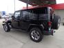 2013 BLACK JEEP WRANGLER UNLIMI SAHARA (1C4HJWEGXDL) with an 3.6L engine, Automatic transmission, located at 6610 L St., Omaha, NE, 68117, (402) 731-7800, 41.212872, -96.014702 - THIS VEHICLE HAS A BEEN FULLY INSPECTED AND HAS A CLEAN TITLE WITH A FREE CARFAX REPORT. SHARP 2-OWNER SAHARA WITH A CLEAN CARFAX, LOW MILEAGE, RUST-FREE UNDERCARRIAGE, HEATED SEATS, NAV, PREMIUM AUDIO AND NEWER TIRES! *****We have found that most customers do the majority of their shopping onl - Photo#5