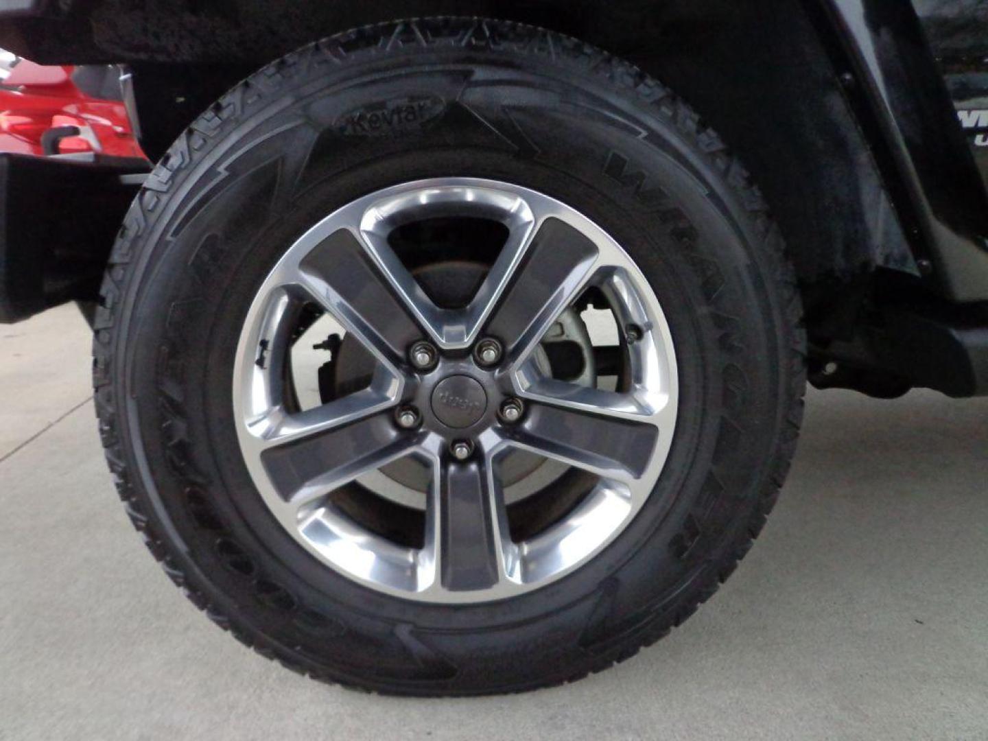 2013 BLACK JEEP WRANGLER UNLIMI SAHARA (1C4HJWEGXDL) with an 3.6L engine, Automatic transmission, located at 6610 L St., Omaha, NE, 68117, (402) 731-7800, 41.212872, -96.014702 - THIS VEHICLE HAS A BEEN FULLY INSPECTED AND HAS A CLEAN TITLE WITH A FREE CARFAX REPORT. SHARP 2-OWNER SAHARA WITH A CLEAN CARFAX, LOW MILEAGE, RUST-FREE UNDERCARRIAGE, HEATED SEATS, NAV, PREMIUM AUDIO AND NEWER TIRES! *****We have found that most customers do the majority of their shopping onl - Photo#7