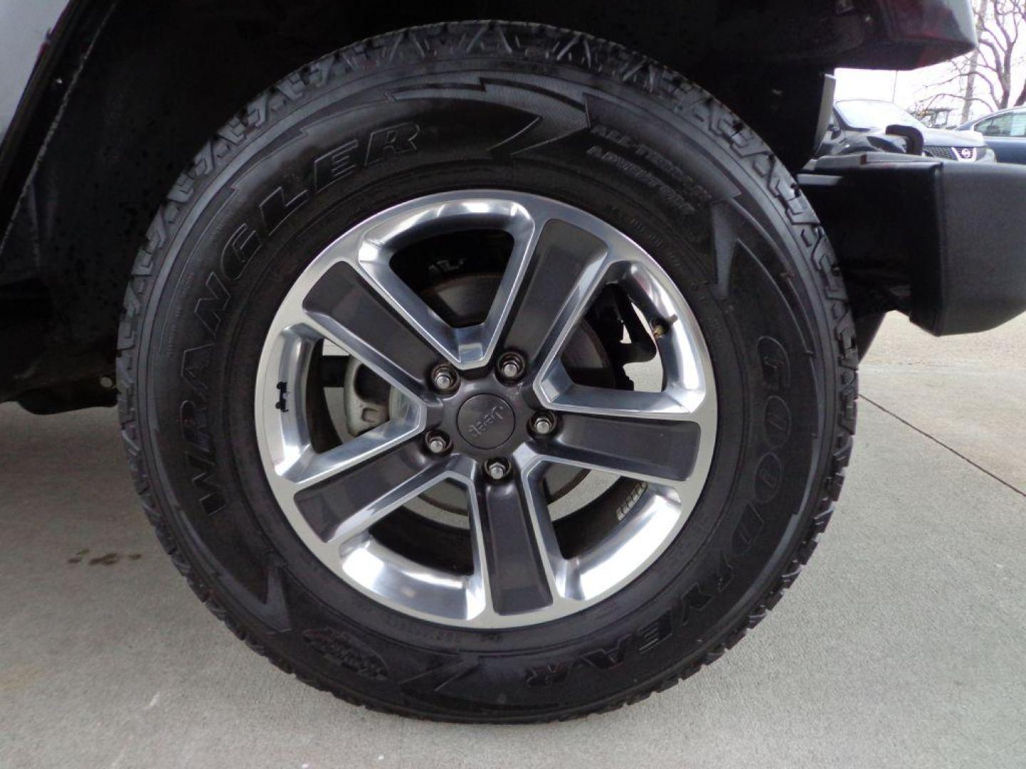 2013 BLACK JEEP WRANGLER UNLIMI SAHARA (1C4HJWEGXDL) with an 3.6L engine, Automatic transmission, located at 6610 L St., Omaha, NE, 68117, (402) 731-7800, 41.212872, -96.014702 - THIS VEHICLE HAS A BEEN FULLY INSPECTED AND HAS A CLEAN TITLE WITH A FREE CARFAX REPORT. SHARP 2-OWNER SAHARA WITH A CLEAN CARFAX, LOW MILEAGE, RUST-FREE UNDERCARRIAGE, HEATED SEATS, NAV, PREMIUM AUDIO AND NEWER TIRES! *****We have found that most customers do the majority of their shopping onl - Photo#8