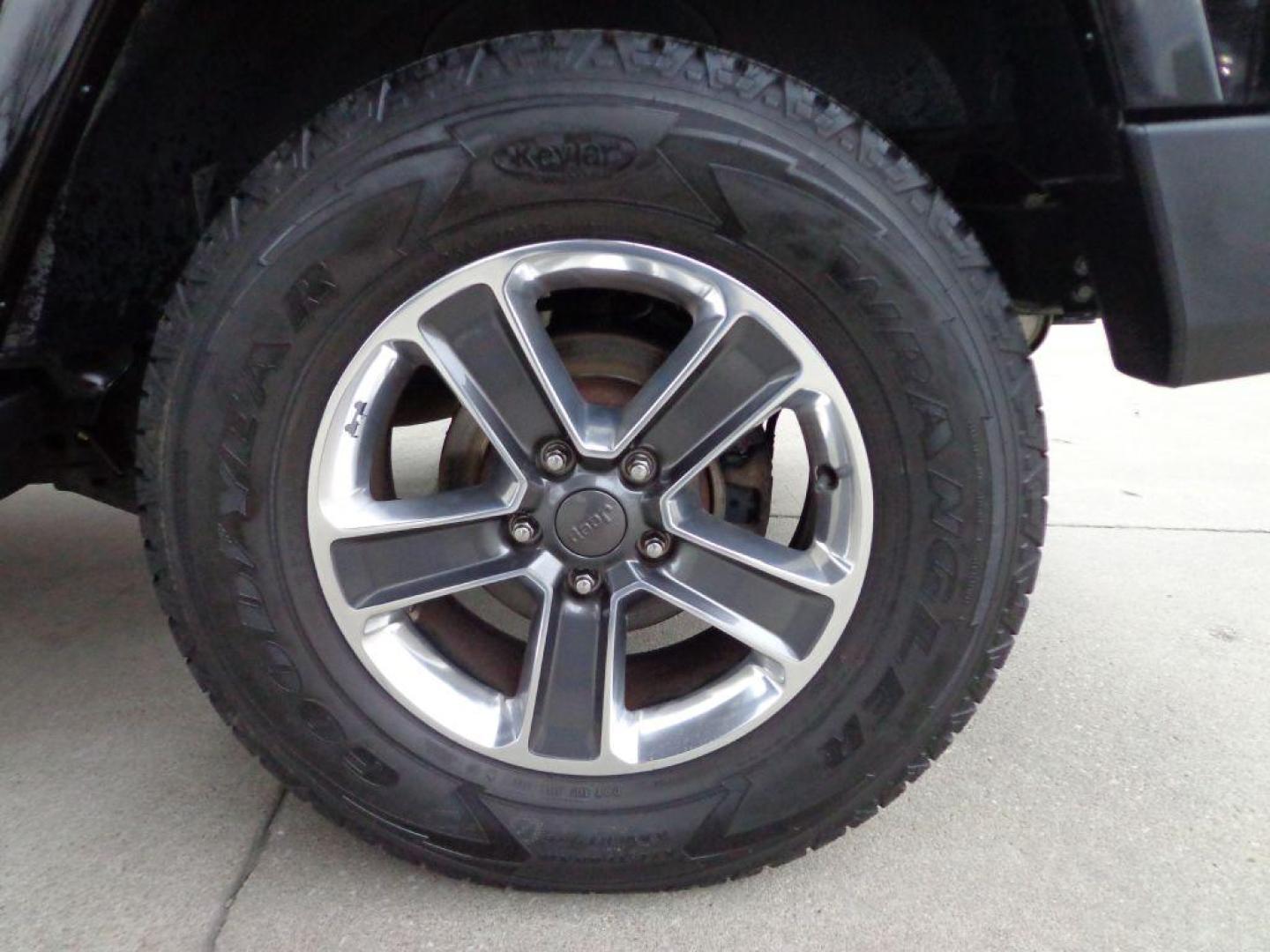 2013 BLACK JEEP WRANGLER UNLIMI SAHARA (1C4HJWEGXDL) with an 3.6L engine, Automatic transmission, located at 6610 L St., Omaha, NE, 68117, (402) 731-7800, 41.212872, -96.014702 - THIS VEHICLE HAS A BEEN FULLY INSPECTED AND HAS A CLEAN TITLE WITH A FREE CARFAX REPORT. SHARP 2-OWNER SAHARA WITH A CLEAN CARFAX, LOW MILEAGE, RUST-FREE UNDERCARRIAGE, HEATED SEATS, NAV, PREMIUM AUDIO AND NEWER TIRES! *****We have found that most customers do the majority of their shopping onl - Photo#10