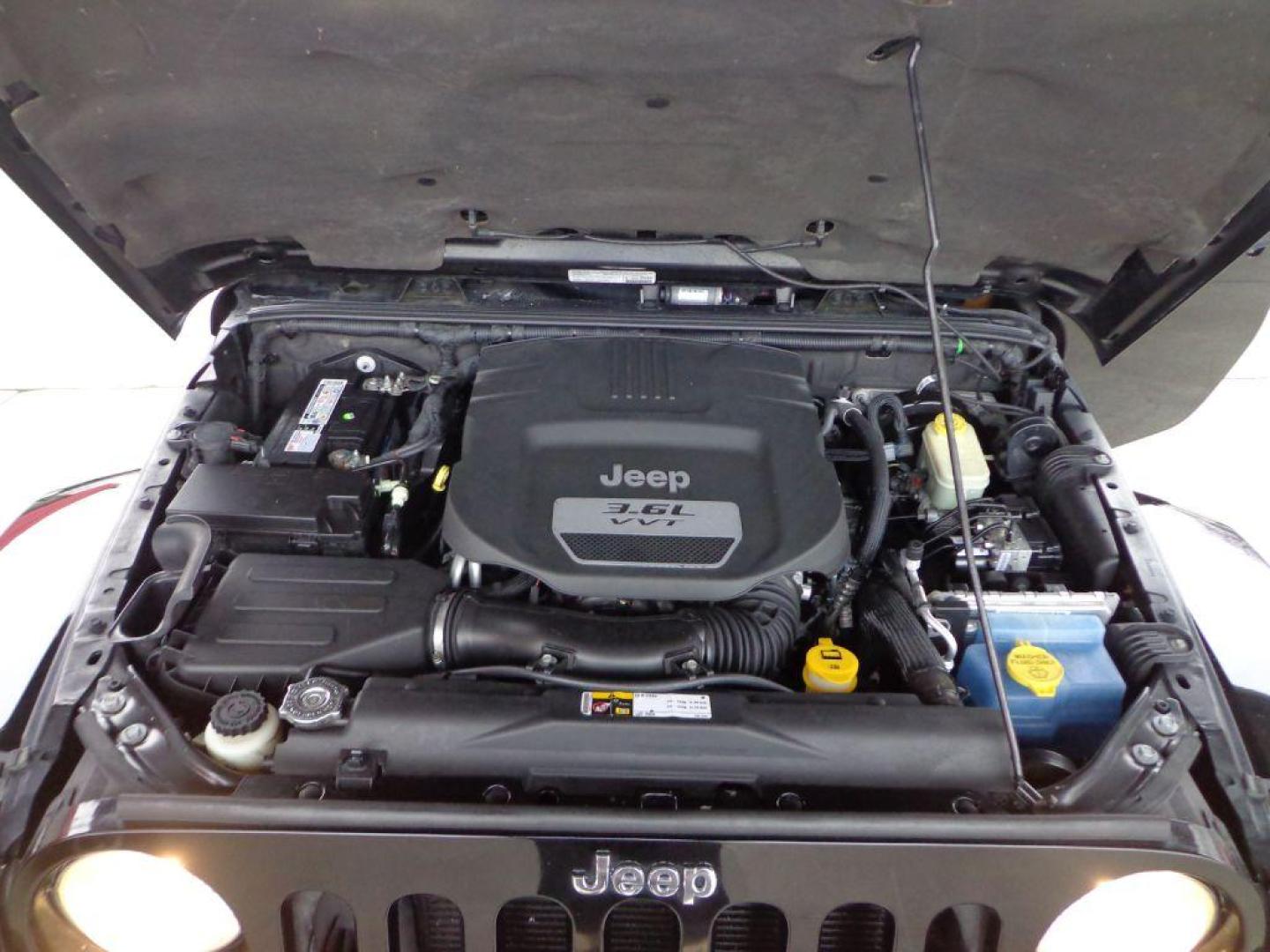 2013 BLACK JEEP WRANGLER UNLIMI SAHARA (1C4HJWEGXDL) with an 3.6L engine, Automatic transmission, located at 6610 L St., Omaha, NE, 68117, (402) 731-7800, 41.212872, -96.014702 - THIS VEHICLE HAS A BEEN FULLY INSPECTED AND HAS A CLEAN TITLE WITH A FREE CARFAX REPORT. SHARP 2-OWNER SAHARA WITH A CLEAN CARFAX, LOW MILEAGE, RUST-FREE UNDERCARRIAGE, HEATED SEATS, NAV, PREMIUM AUDIO AND NEWER TIRES! *****We have found that most customers do the majority of their shopping onl - Photo#11