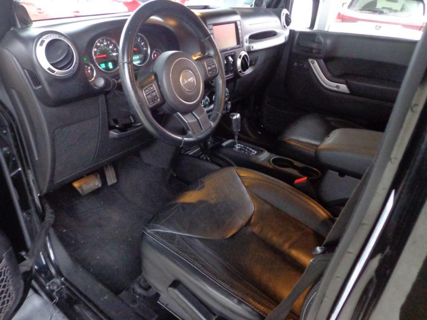 2013 BLACK JEEP WRANGLER UNLIMI SAHARA (1C4HJWEGXDL) with an 3.6L engine, Automatic transmission, located at 6610 L St., Omaha, NE, 68117, (402) 731-7800, 41.212872, -96.014702 - THIS VEHICLE HAS A BEEN FULLY INSPECTED AND HAS A CLEAN TITLE WITH A FREE CARFAX REPORT. SHARP 2-OWNER SAHARA WITH A CLEAN CARFAX, LOW MILEAGE, RUST-FREE UNDERCARRIAGE, HEATED SEATS, NAV, PREMIUM AUDIO AND NEWER TIRES! *****We have found that most customers do the majority of their shopping onl - Photo#14