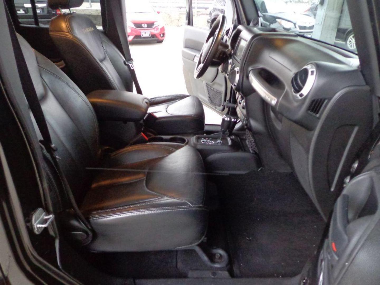 2013 BLACK JEEP WRANGLER UNLIMI SAHARA (1C4HJWEGXDL) with an 3.6L engine, Automatic transmission, located at 6610 L St., Omaha, NE, 68117, (402) 731-7800, 41.212872, -96.014702 - THIS VEHICLE HAS A BEEN FULLY INSPECTED AND HAS A CLEAN TITLE WITH A FREE CARFAX REPORT. SHARP 2-OWNER SAHARA WITH A CLEAN CARFAX, LOW MILEAGE, RUST-FREE UNDERCARRIAGE, HEATED SEATS, NAV, PREMIUM AUDIO AND NEWER TIRES! *****We have found that most customers do the majority of their shopping onl - Photo#15