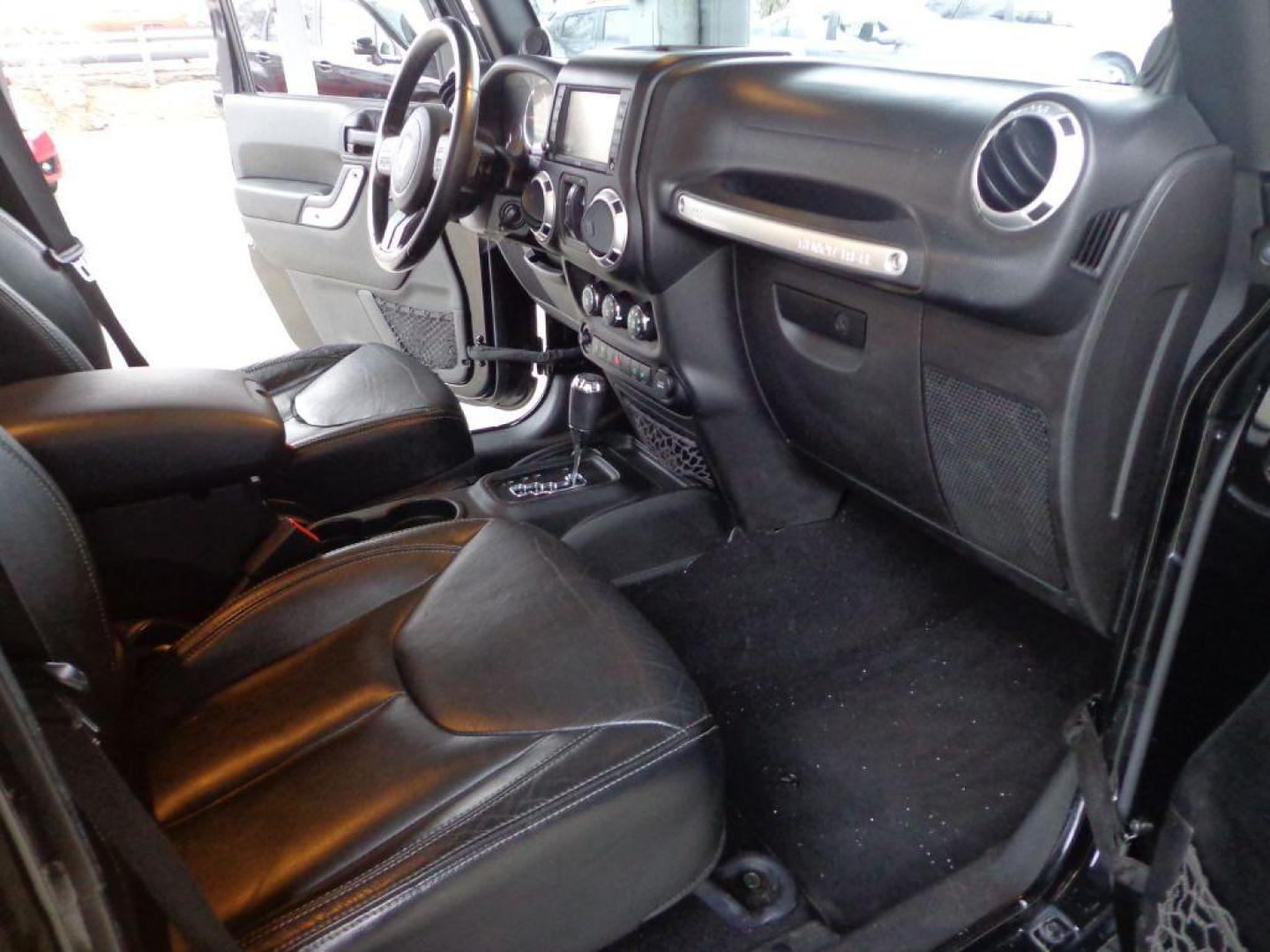 2013 BLACK JEEP WRANGLER UNLIMI SAHARA (1C4HJWEGXDL) with an 3.6L engine, Automatic transmission, located at 6610 L St., Omaha, NE, 68117, (402) 731-7800, 41.212872, -96.014702 - THIS VEHICLE HAS A BEEN FULLY INSPECTED AND HAS A CLEAN TITLE WITH A FREE CARFAX REPORT. SHARP 2-OWNER SAHARA WITH A CLEAN CARFAX, LOW MILEAGE, RUST-FREE UNDERCARRIAGE, HEATED SEATS, NAV, PREMIUM AUDIO AND NEWER TIRES! *****We have found that most customers do the majority of their shopping onl - Photo#17