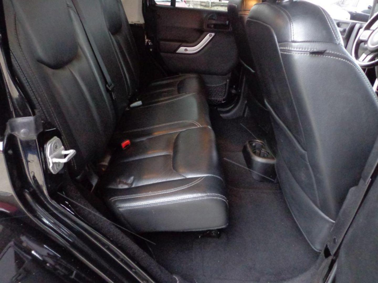 2013 BLACK JEEP WRANGLER UNLIMI SAHARA (1C4HJWEGXDL) with an 3.6L engine, Automatic transmission, located at 6610 L St., Omaha, NE, 68117, (402) 731-7800, 41.212872, -96.014702 - THIS VEHICLE HAS A BEEN FULLY INSPECTED AND HAS A CLEAN TITLE WITH A FREE CARFAX REPORT. SHARP 2-OWNER SAHARA WITH A CLEAN CARFAX, LOW MILEAGE, RUST-FREE UNDERCARRIAGE, HEATED SEATS, NAV, PREMIUM AUDIO AND NEWER TIRES! *****We have found that most customers do the majority of their shopping onl - Photo#18