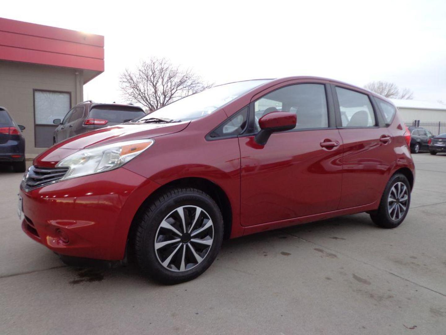 2015 RED NISSAN VERSA NOTE SV (3N1CE2CP2FL) with an 1.6L engine, Continuously Variable transmission, located at 6610 L St., Omaha, NE, 68117, (402) 731-7800, 41.212872, -96.014702 - THIS VEHICLE HAS A BEEN FULLY INSPECTED AND HAS A CLEAN TITLE WITH A FREE CARFAX REPORT PROVIDED! FRESH TRADE, RUNS AND DRIVES WELL WITH NEWER TIRES! *****We have found that most customers do the majority of their shopping online before visiting a ealership. For this reason we feel it necessary - Photo#0