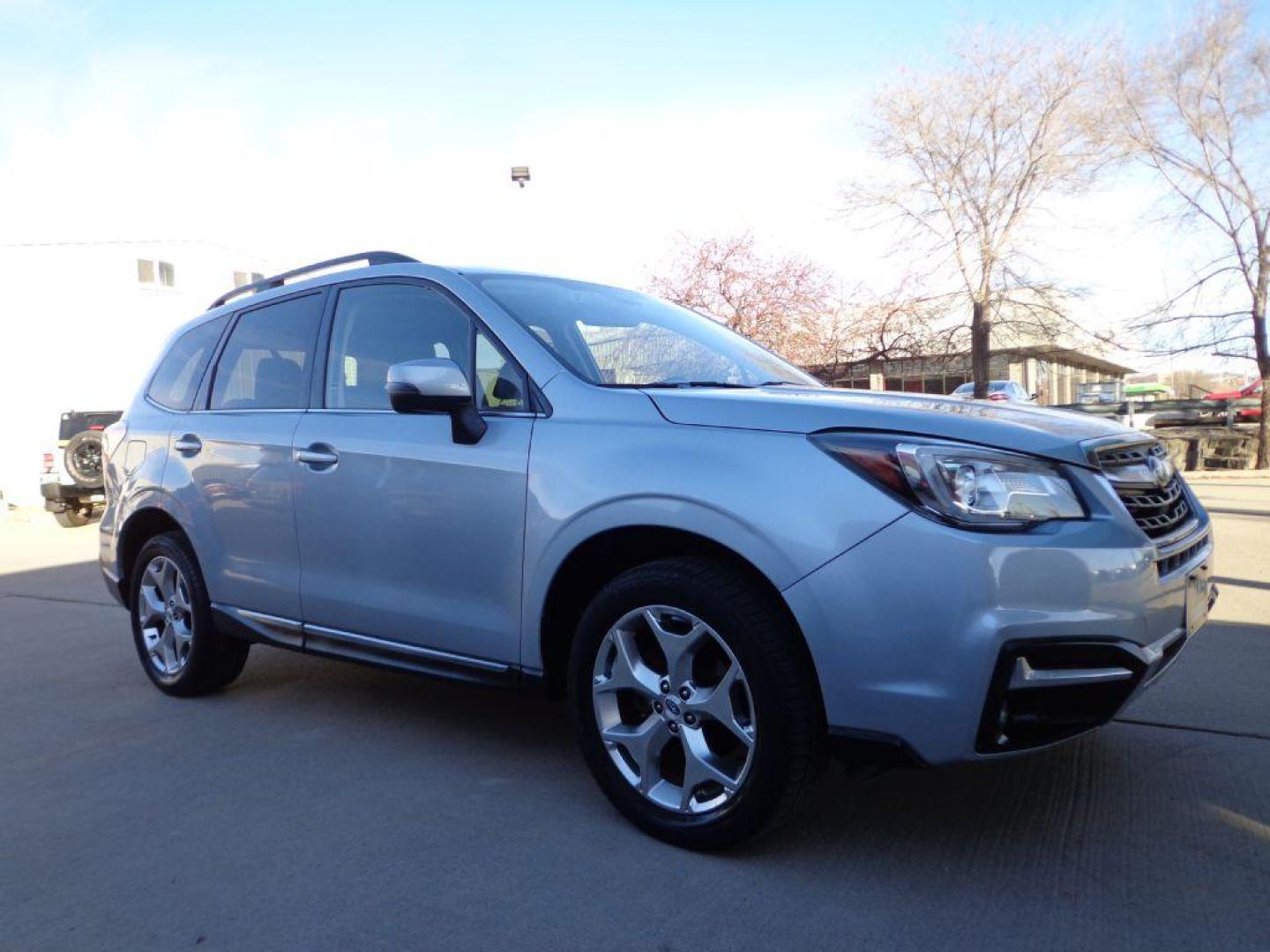 2017 SILVER SUBARU FORESTER 2.5I TOURING (JF2SJAWC9HH) with an 2.5L engine, Automatic transmission, located at 6610 L St., Omaha, NE, 68117, (402) 731-7800, 41.212872, -96.014702 - THIS VEHICLE HAS A BEEN FULLY INSPECTED AND HAS A CLEAN TITLE WITH A FREE CARFAX REPORT PROVIDED! 1-OWNER, CLEAN CARFAX,LOW MILEAGE, LOADED WITH OPTIONS! *****We have found that most customers do the majority of their shopping online before visiting a ealership. For this reason we feel it neces - Photo#2