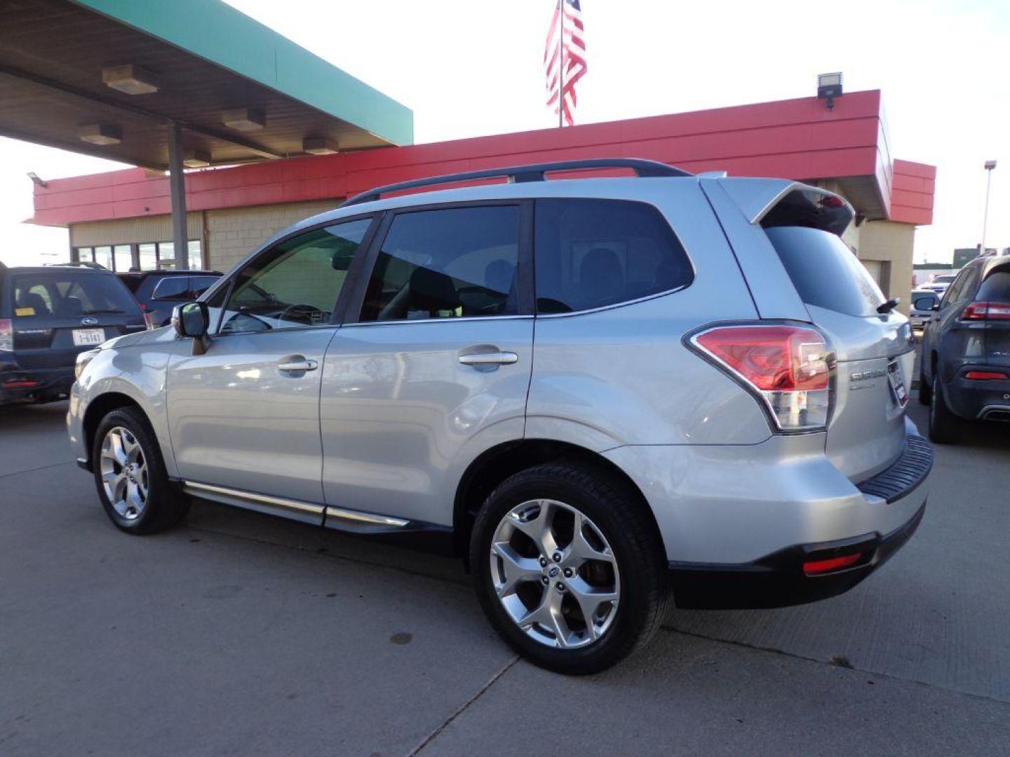 2017 SILVER SUBARU FORESTER 2.5I TOURING (JF2SJAWC9HH) with an 2.5L engine, Automatic transmission, located at 6610 L St., Omaha, NE, 68117, (402) 731-7800, 41.212872, -96.014702 - THIS VEHICLE HAS A BEEN FULLY INSPECTED AND HAS A CLEAN TITLE WITH A FREE CARFAX REPORT PROVIDED! 1-OWNER, CLEAN CARFAX,LOW MILEAGE, LOADED WITH OPTIONS! *****We have found that most customers do the majority of their shopping online before visiting a ealership. For this reason we feel it neces - Photo#5