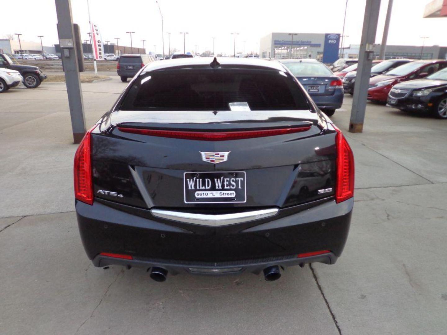 2015 BLACK CADILLAC ATS PREMIUM (1G6AM5S34F0) with an 3.6L engine, Automatic transmission, located at 6610 L St., Omaha, NE, 68117, (402) 731-7800, 41.212872, -96.014702 - Photo#4