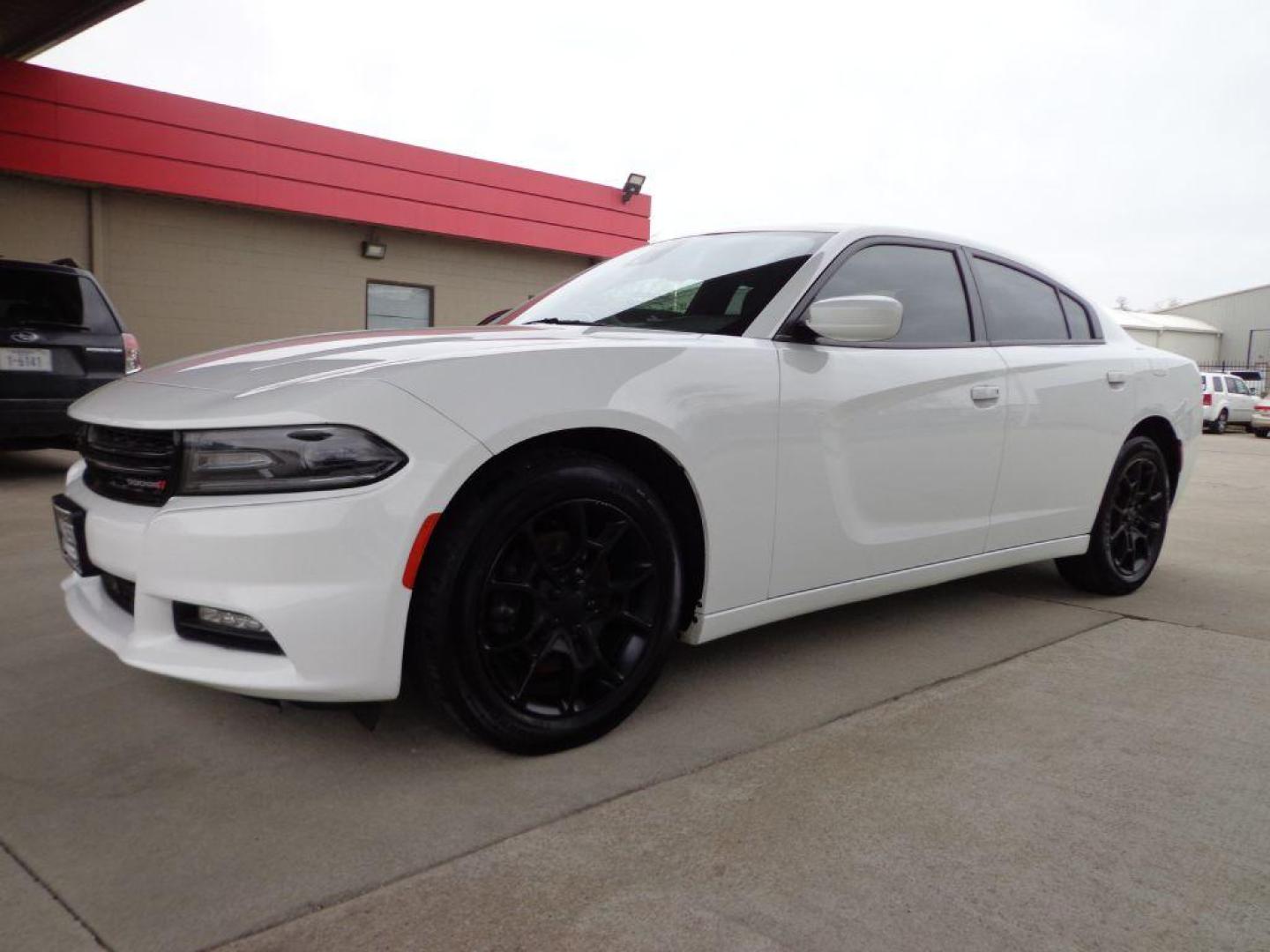 2015 WHITE DODGE CHARGER SXT (2C3CDXJG7FH) with an 3.6L engine, Automatic transmission, located at 6610 L St., Omaha, NE, 68117, (402) 731-7800, 41.212872, -96.014702 - THIS VEHICLE HAS A BEEN FULLY INSPECTED AND HAS A CLEAN TITLE WITH A FREE CARFAX REPORT PROVIDED! 1-OWNER, CLEAN CARFAX, LOW MILEAGE, AWD, HEATED/COOLED SEATS, LANE DEPARTURE, ADAPTIVE CRUISE, PREMIUM AUDIO, NAV, BACKUP CAM AND MUCH MORE *****We have found that most customers do the majority of - Photo#0