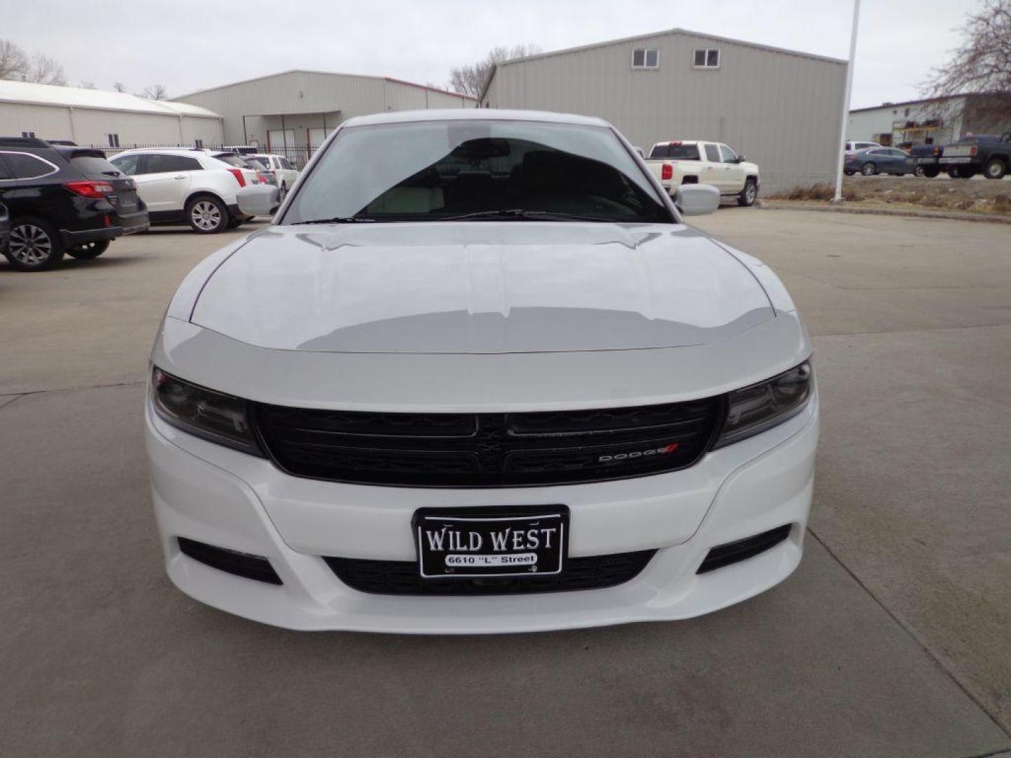 2015 WHITE DODGE CHARGER SXT (2C3CDXJG7FH) with an 3.6L engine, Automatic transmission, located at 6610 L St., Omaha, NE, 68117, (402) 731-7800, 41.212872, -96.014702 - THIS VEHICLE HAS A BEEN FULLY INSPECTED AND HAS A CLEAN TITLE WITH A FREE CARFAX REPORT PROVIDED! 1-OWNER, CLEAN CARFAX, LOW MILEAGE, AWD, HEATED/COOLED SEATS, LANE DEPARTURE, ADAPTIVE CRUISE, PREMIUM AUDIO, NAV, BACKUP CAM AND MUCH MORE *****We have found that most customers do the majority of - Photo#1