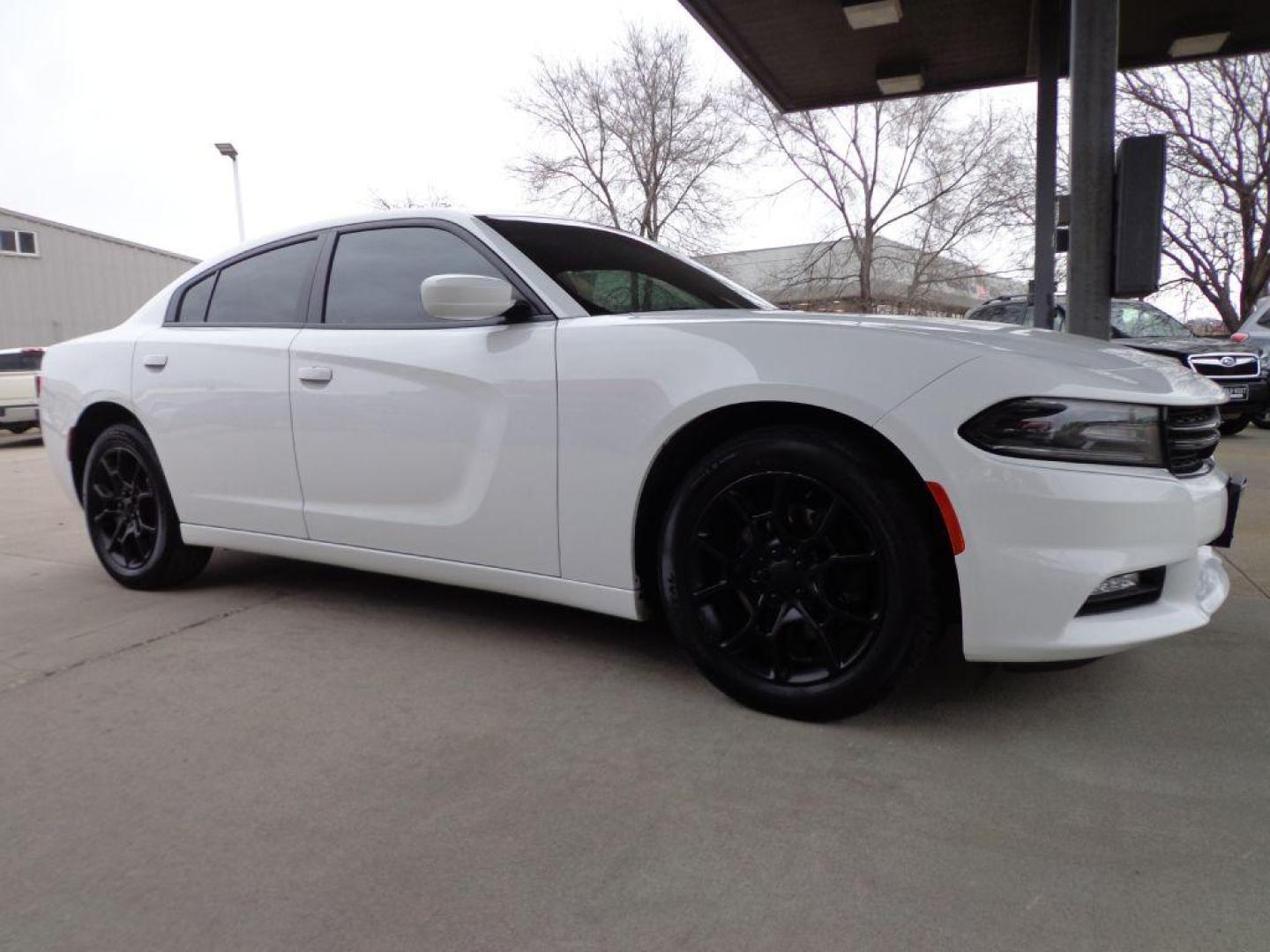 2015 WHITE DODGE CHARGER SXT (2C3CDXJG7FH) with an 3.6L engine, Automatic transmission, located at 6610 L St., Omaha, NE, 68117, (402) 731-7800, 41.212872, -96.014702 - THIS VEHICLE HAS A BEEN FULLY INSPECTED AND HAS A CLEAN TITLE WITH A FREE CARFAX REPORT PROVIDED! 1-OWNER, CLEAN CARFAX, LOW MILEAGE, AWD, HEATED/COOLED SEATS, LANE DEPARTURE, ADAPTIVE CRUISE, PREMIUM AUDIO, NAV, BACKUP CAM AND MUCH MORE *****We have found that most customers do the majority of - Photo#2