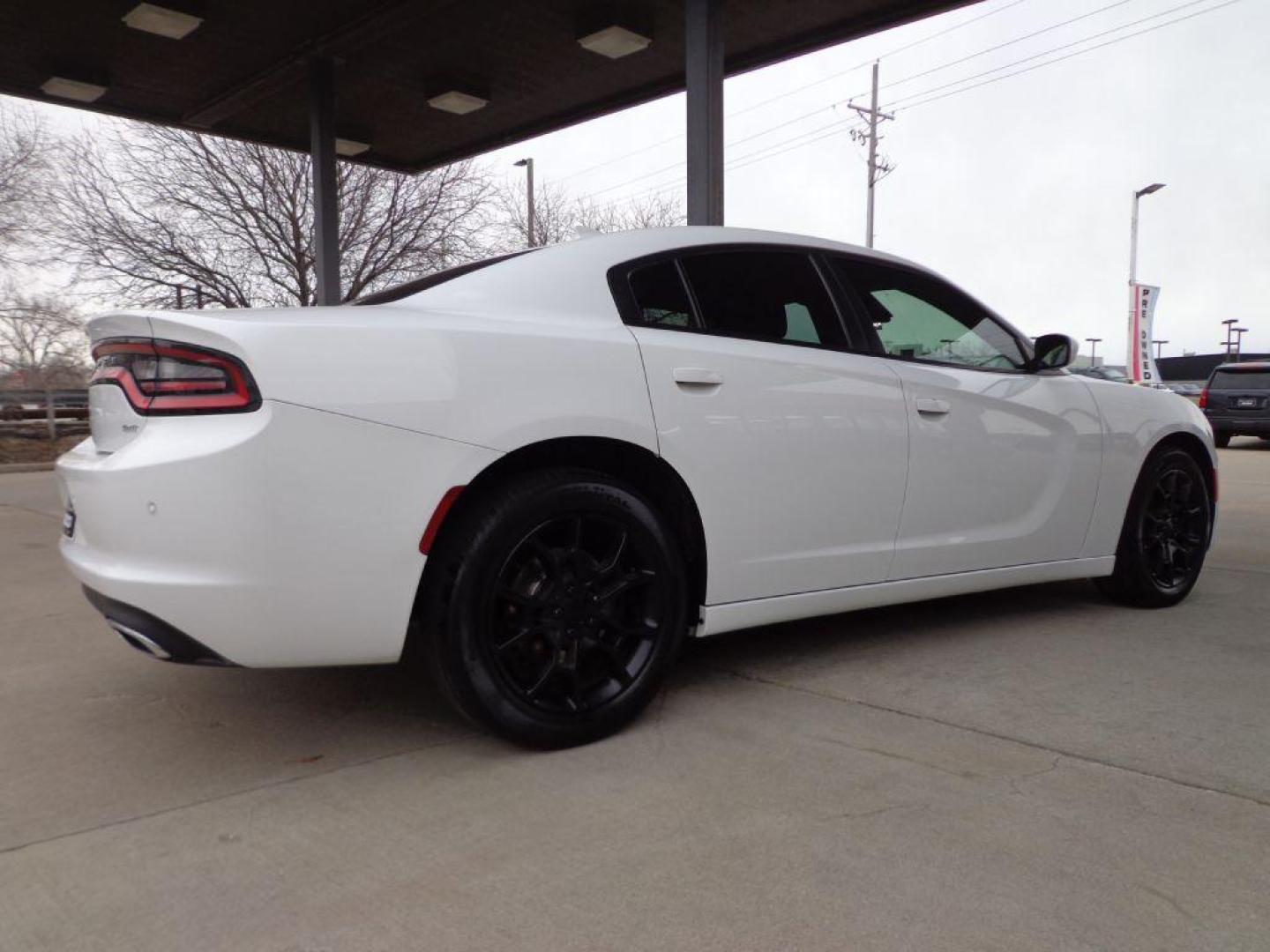 2015 WHITE DODGE CHARGER SXT (2C3CDXJG7FH) with an 3.6L engine, Automatic transmission, located at 6610 L St., Omaha, NE, 68117, (402) 731-7800, 41.212872, -96.014702 - THIS VEHICLE HAS A BEEN FULLY INSPECTED AND HAS A CLEAN TITLE WITH A FREE CARFAX REPORT PROVIDED! 1-OWNER, CLEAN CARFAX, LOW MILEAGE, AWD, HEATED/COOLED SEATS, LANE DEPARTURE, ADAPTIVE CRUISE, PREMIUM AUDIO, NAV, BACKUP CAM AND MUCH MORE *****We have found that most customers do the majority of - Photo#3