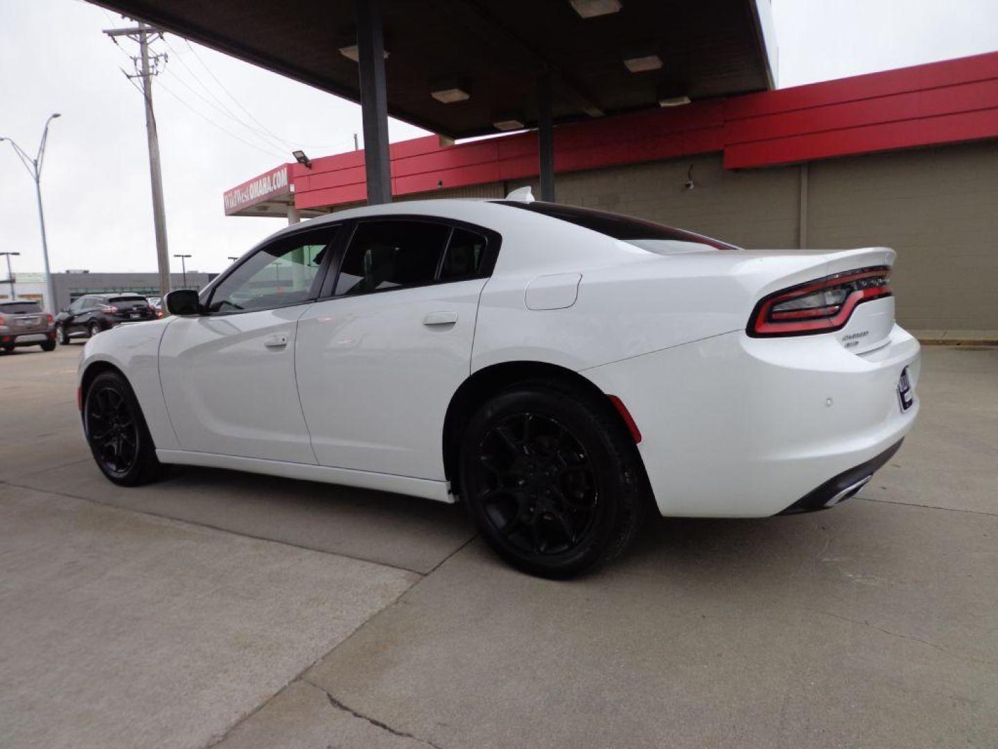 2015 WHITE DODGE CHARGER SXT (2C3CDXJG7FH) with an 3.6L engine, Automatic transmission, located at 6610 L St., Omaha, NE, 68117, (402) 731-7800, 41.212872, -96.014702 - THIS VEHICLE HAS A BEEN FULLY INSPECTED AND HAS A CLEAN TITLE WITH A FREE CARFAX REPORT PROVIDED! 1-OWNER, CLEAN CARFAX, LOW MILEAGE, AWD, HEATED/COOLED SEATS, LANE DEPARTURE, ADAPTIVE CRUISE, PREMIUM AUDIO, NAV, BACKUP CAM AND MUCH MORE *****We have found that most customers do the majority of - Photo#5