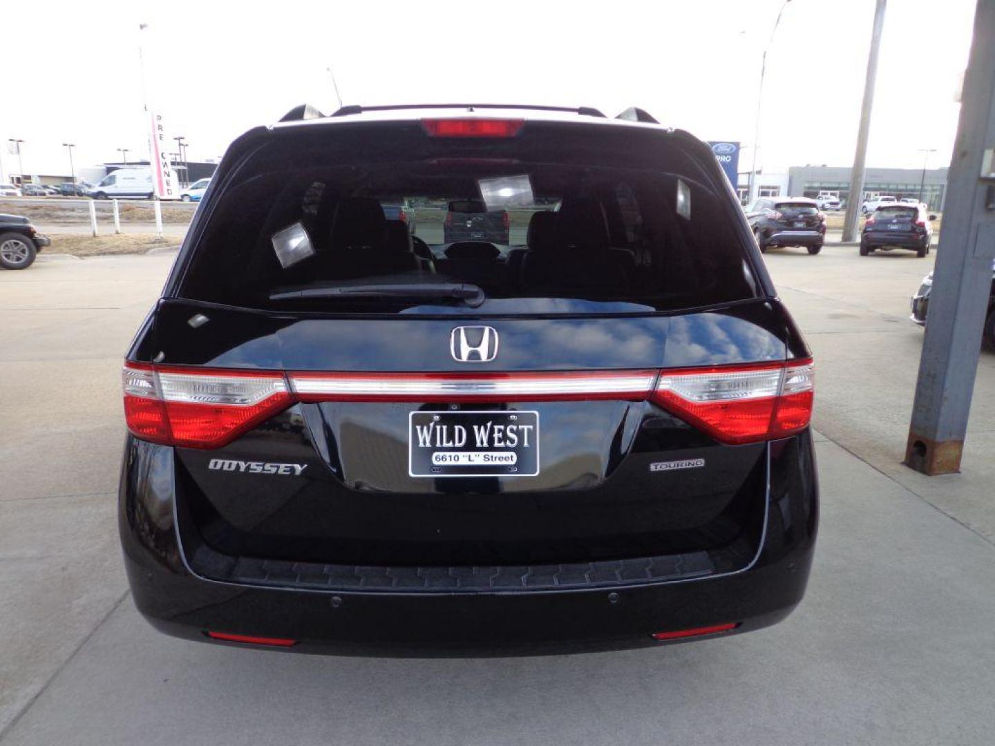 2012 BLACK HONDA ODYSSEY TOURING ELITE (5FNRL5H98CB) with an 3.5L engine, Automatic transmission, located at 6610 L St., Omaha, NE, 68117, (402) 731-7800, 41.212872, -96.014702 - THIS VEHICLE HAS A CLEAN TITLE WITH A FREE CARFAX PROVIDED! 1-OWNER, CLEAN CARFAX, LOW MILEAGE TOURING ELITE! *****We have found that most customers do the majority of their shopping online before visiting a dealership. For this reason we feel it necessary to have a competitive price on our used - Photo#4