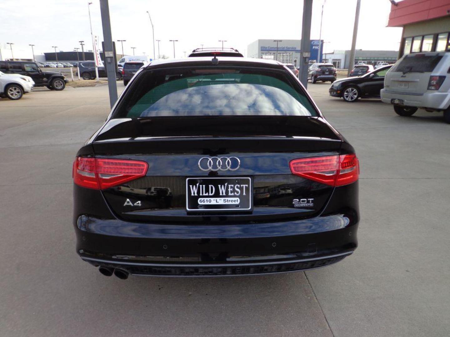 2016 BLACK AUDI A4 PREMIUM PLUS S-LINE (WAUFFAFL8GN) with an 2.0L engine, Automatic transmission, located at 6610 L St., Omaha, NE, 68117, (402) 731-7800, 41.212872, -96.014702 - THIS VEHICLE HAS A BEEN FULLY INSPECTED AND HAS A CLEAN TITLE WITH A FREE CARFAX REPORT PROVIDED! 2-OWNER, CLEAN CARFAX, LOW MILEAGE, S-LINE, NAV AND NEWER TIRES! *****We have found that most customers do the majority of their shopping online before visiting a ealership. For this reason we fe - Photo#4