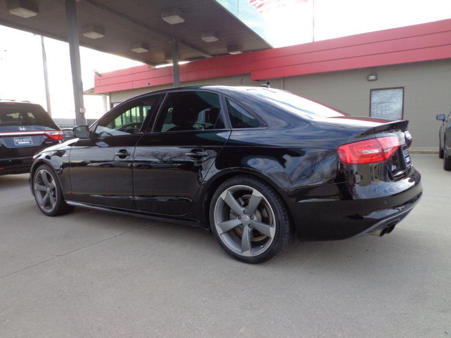 2016 BLACK AUDI A4 PREMIUM PLUS S-LINE (WAUFFAFL8GN) with an 2.0L engine, Automatic transmission, located at 6610 L St., Omaha, NE, 68117, (402) 731-7800, 41.212872, -96.014702 - THIS VEHICLE HAS A BEEN FULLY INSPECTED AND HAS A CLEAN TITLE WITH A FREE CARFAX REPORT PROVIDED! 2-OWNER, CLEAN CARFAX, LOW MILEAGE, S-LINE, NAV AND NEWER TIRES! *****We have found that most customers do the majority of their shopping online before visiting a ealership. For this reason we fe - Photo#5