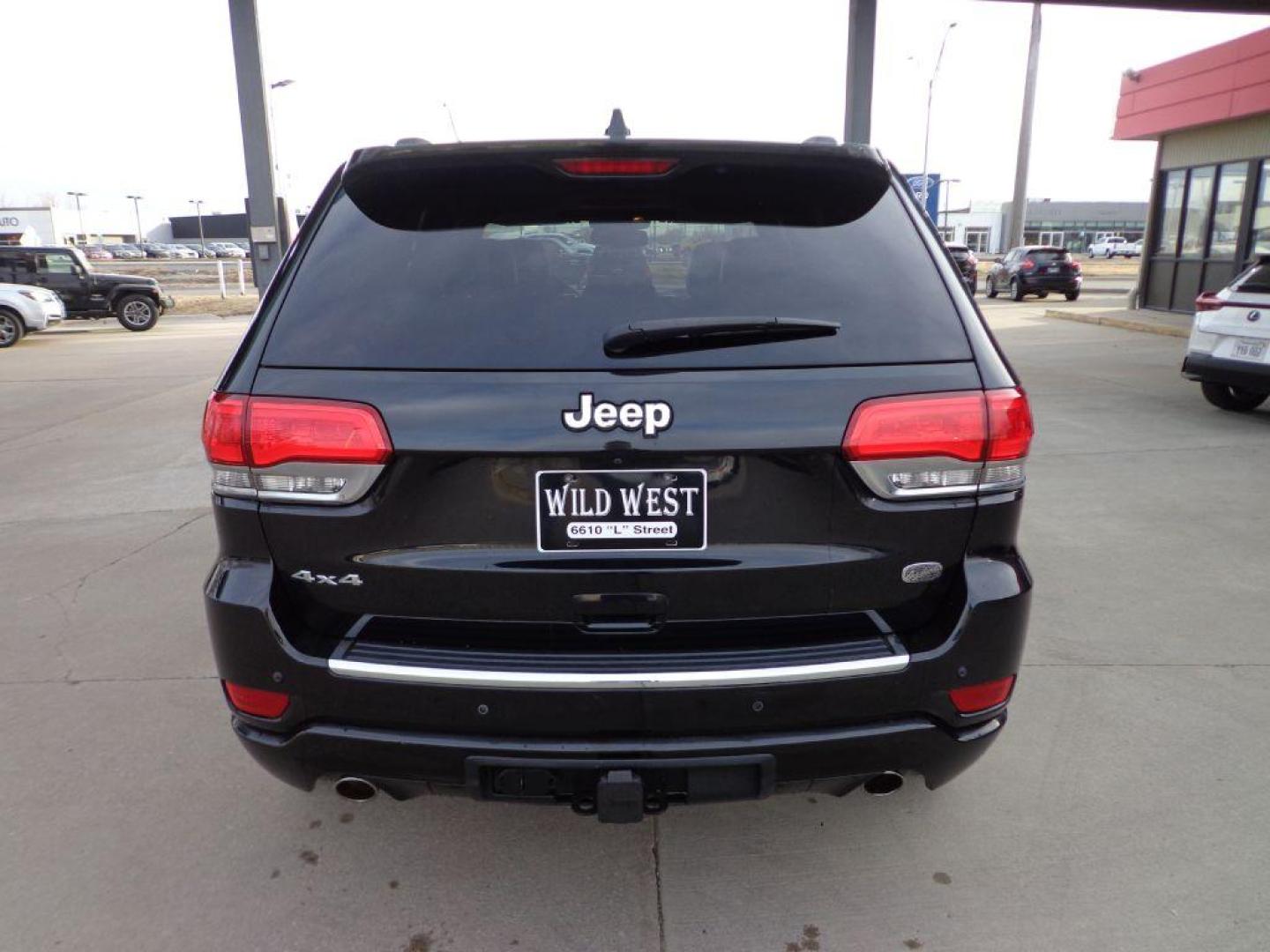 2014 BLACK JEEP GRAND CHEROKEE OVERLAND (1C4RJFCG1EC) with an 3.6L engine, Automatic transmission, located at 6610 L St., Omaha, NE, 68117, (402) 731-7800, 41.212872, -96.014702 - 2-OWNER, CLEAN CARFAX OVERLAND, PANORAMIC ROOF, NAV, HEATED FRONT/REAR SEATS, NEWER TIRES AND MUCH MORE! *****We have found that most customers do the majority of their shopping online before visiting a dealership. For this reason we feel it necessary to have a competitive price on our used ve - Photo#4