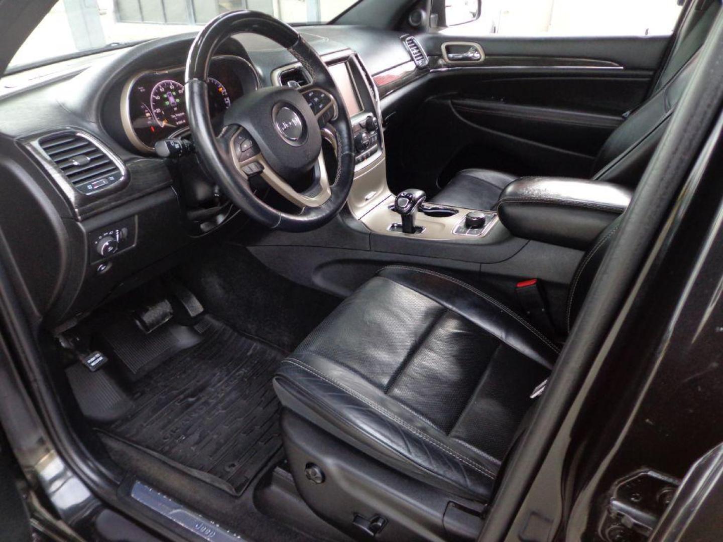 2014 BLACK JEEP GRAND CHEROKEE OVERLAND (1C4RJFCG1EC) with an 3.6L engine, Automatic transmission, located at 6610 L St., Omaha, NE, 68117, (402) 731-7800, 41.212872, -96.014702 - 2-OWNER, CLEAN CARFAX OVERLAND, PANORAMIC ROOF, NAV, HEATED FRONT/REAR SEATS, NEWER TIRES AND MUCH MORE! *****We have found that most customers do the majority of their shopping online before visiting a dealership. For this reason we feel it necessary to have a competitive price on our used ve - Photo#11