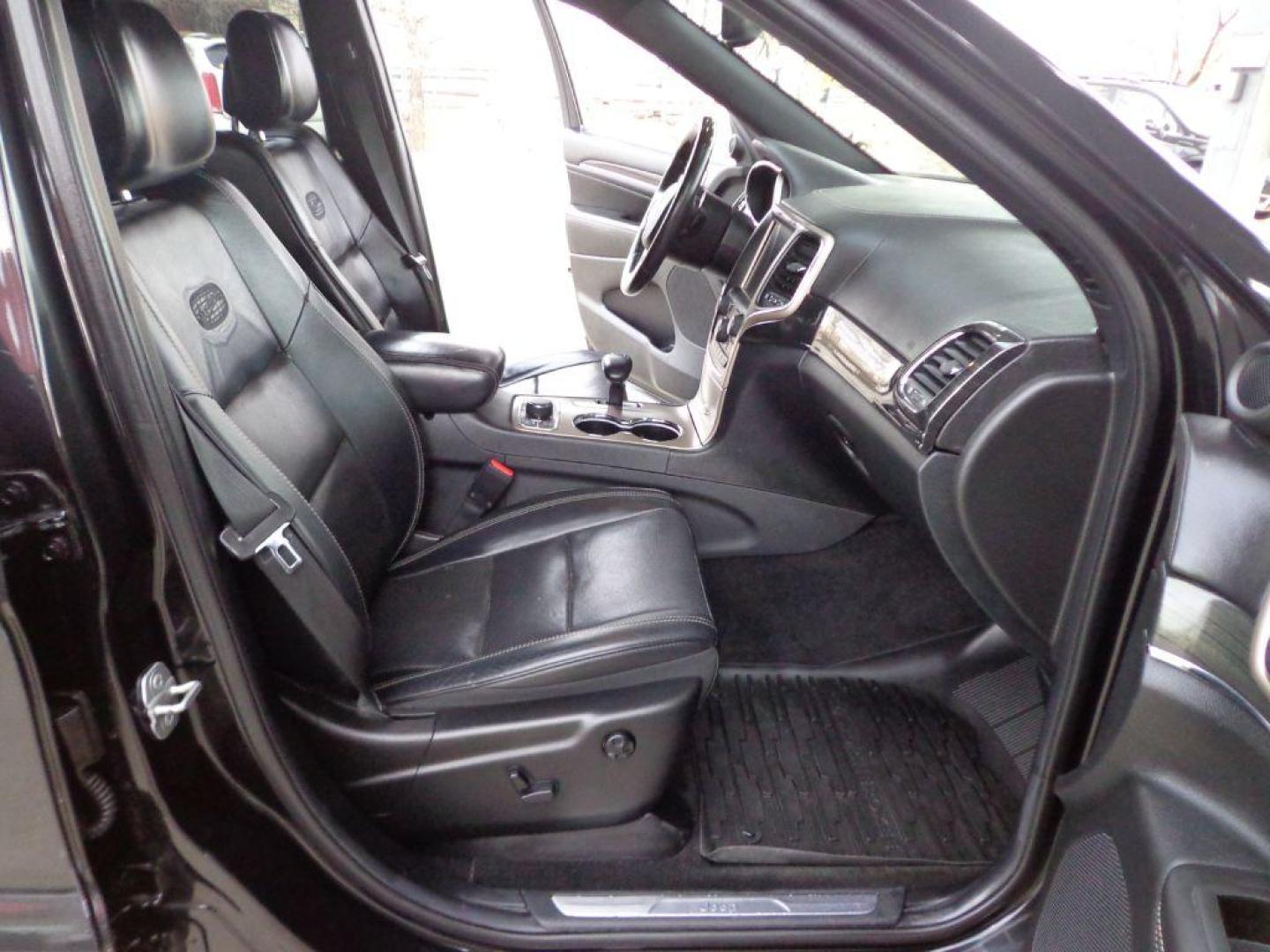 2014 BLACK JEEP GRAND CHEROKEE OVERLAND (1C4RJFCG1EC) with an 3.6L engine, Automatic transmission, located at 6610 L St., Omaha, NE, 68117, (402) 731-7800, 41.212872, -96.014702 - 2-OWNER, CLEAN CARFAX OVERLAND, PANORAMIC ROOF, NAV, HEATED FRONT/REAR SEATS, NEWER TIRES AND MUCH MORE! *****We have found that most customers do the majority of their shopping online before visiting a dealership. For this reason we feel it necessary to have a competitive price on our used ve - Photo#12