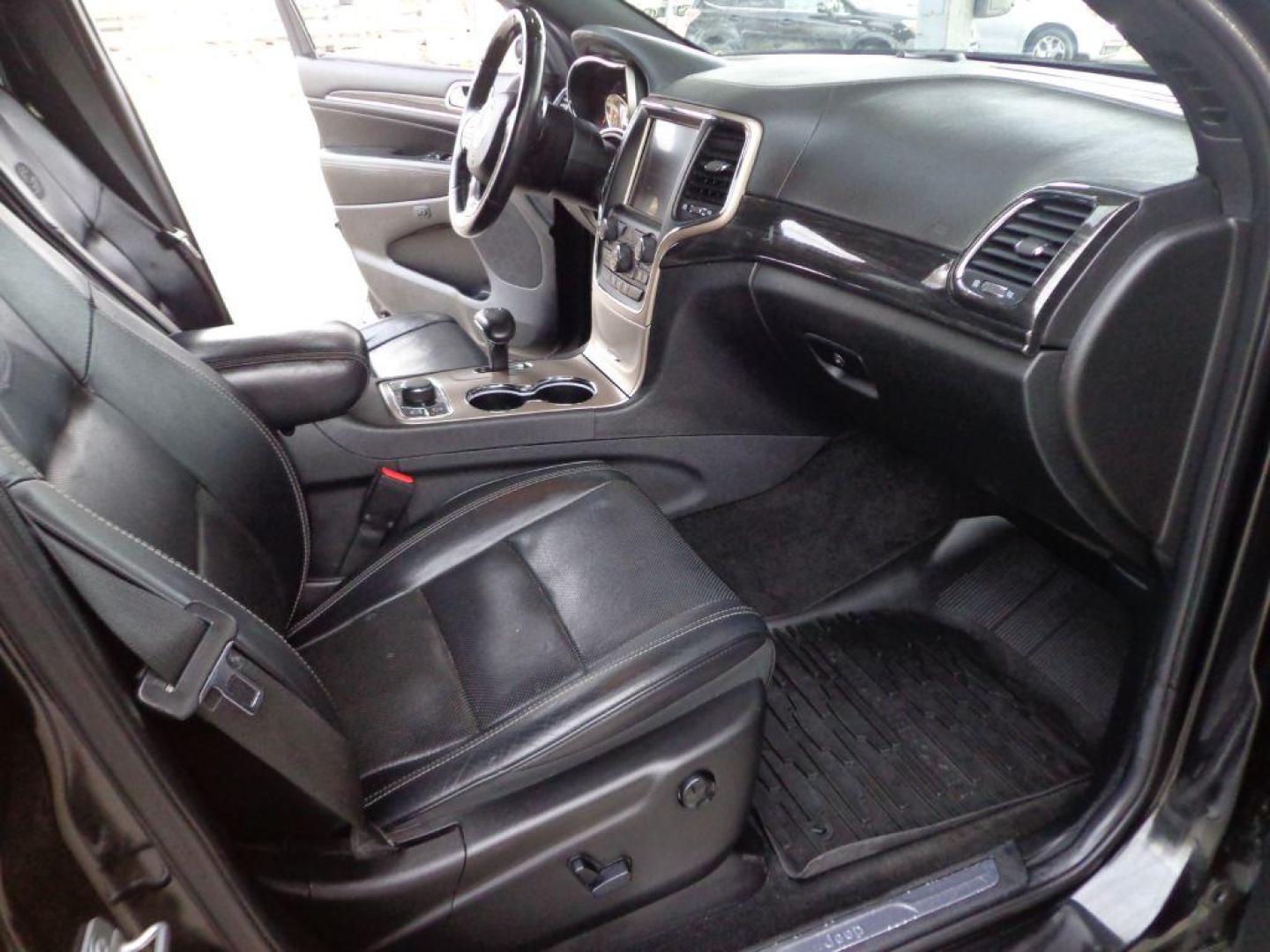 2014 BLACK JEEP GRAND CHEROKEE OVERLAND (1C4RJFCG1EC) with an 3.6L engine, Automatic transmission, located at 6610 L St., Omaha, NE, 68117, (402) 731-7800, 41.212872, -96.014702 - 2-OWNER, CLEAN CARFAX OVERLAND, PANORAMIC ROOF, NAV, HEATED FRONT/REAR SEATS, NEWER TIRES AND MUCH MORE! *****We have found that most customers do the majority of their shopping online before visiting a dealership. For this reason we feel it necessary to have a competitive price on our used ve - Photo#14