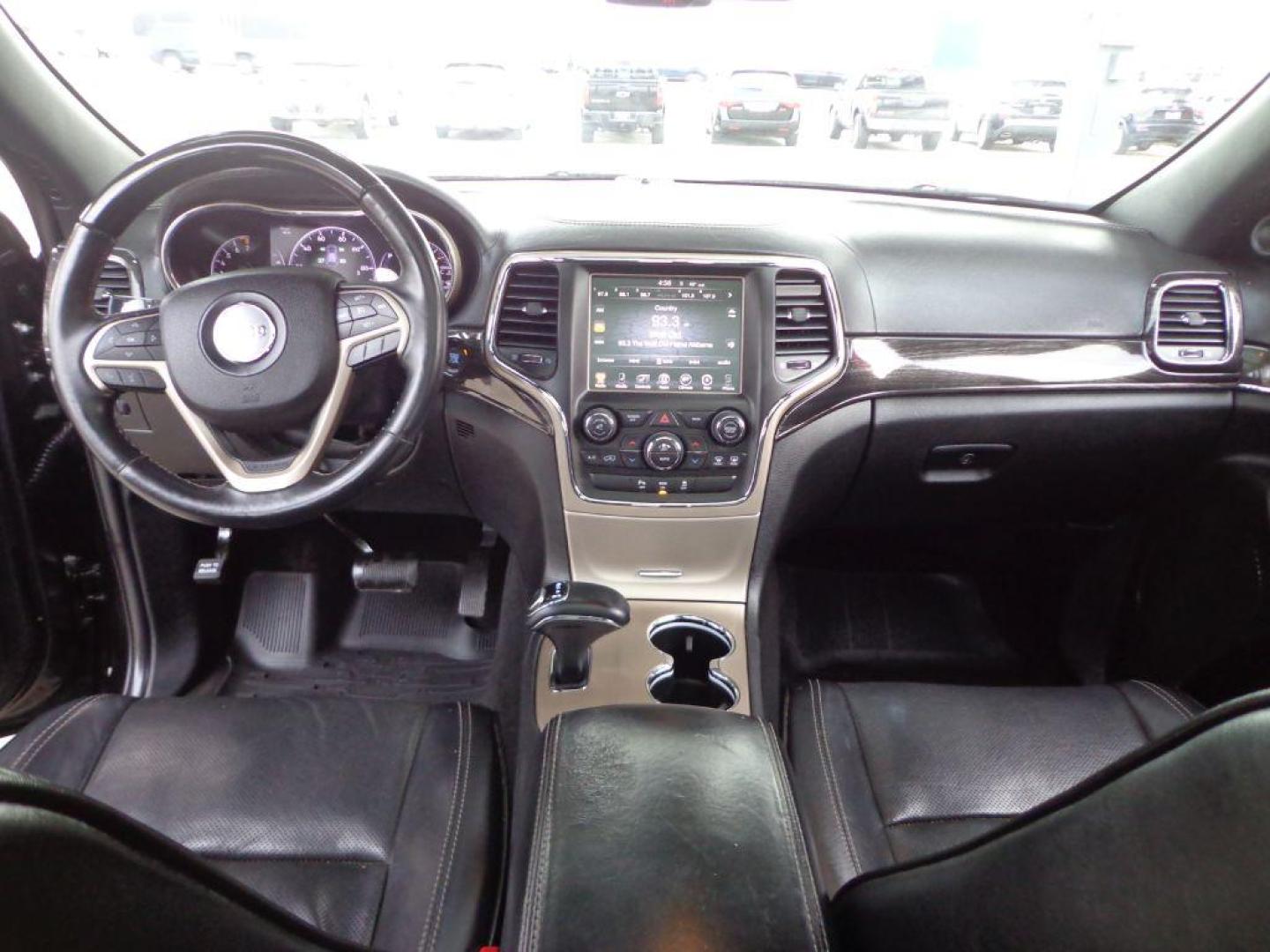 2014 BLACK JEEP GRAND CHEROKEE OVERLAND (1C4RJFCG1EC) with an 3.6L engine, Automatic transmission, located at 6610 L St., Omaha, NE, 68117, (402) 731-7800, 41.212872, -96.014702 - 2-OWNER, CLEAN CARFAX OVERLAND, PANORAMIC ROOF, NAV, HEATED FRONT/REAR SEATS, NEWER TIRES AND MUCH MORE! *****We have found that most customers do the majority of their shopping online before visiting a dealership. For this reason we feel it necessary to have a competitive price on our used ve - Photo#18