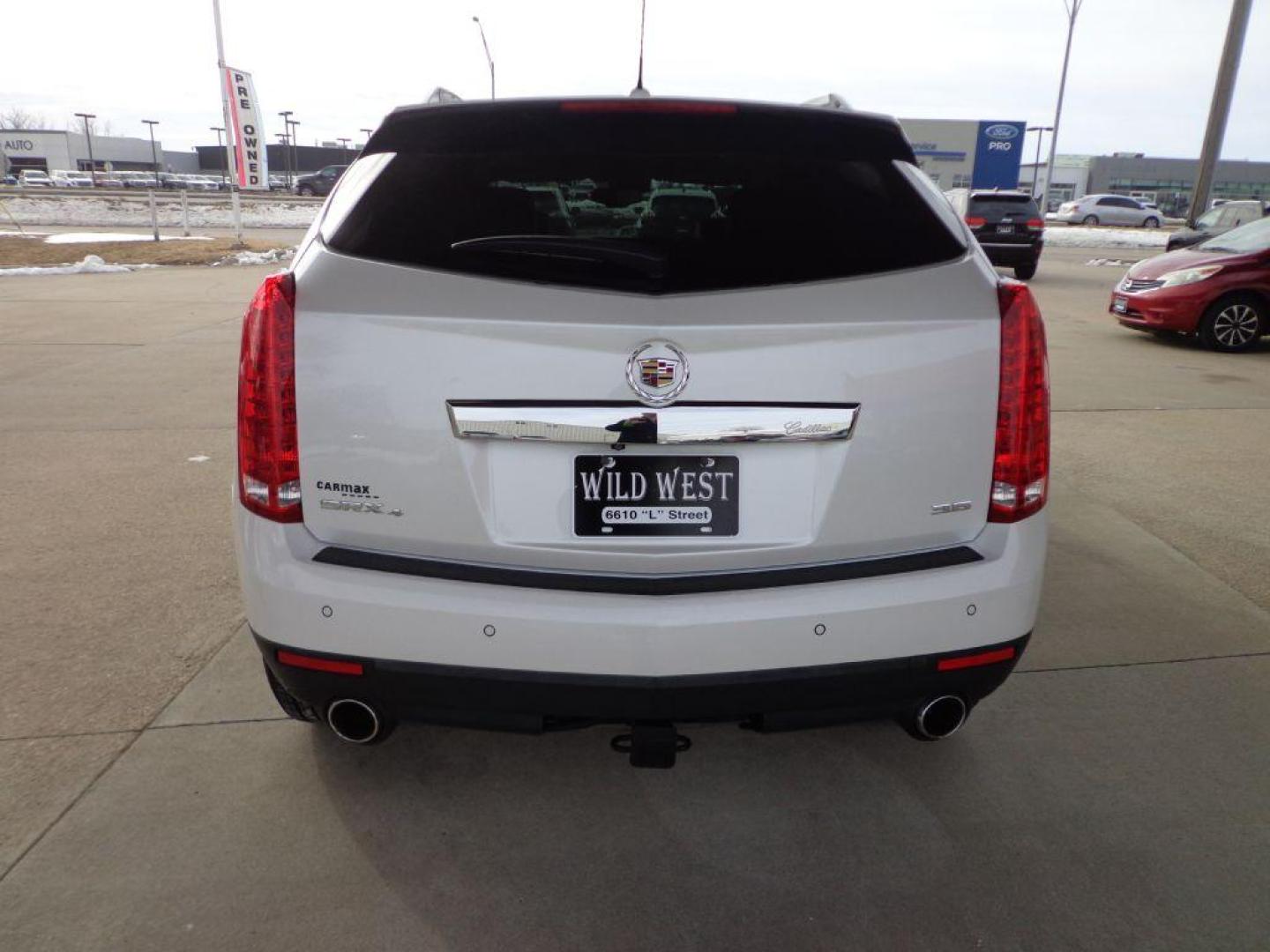 2015 WHITE CADILLAC SRX PERFORMANCE COLLECTION (3GYFNFE38FS) with an 3.6L engine, Automatic transmission, located at 6610 L St., Omaha, NE, 68117, (402) 731-7800, 41.212872, -96.014702 - THIS VEHICLE HAS A BEEN FULLY INSPECTED AND HAS A CLEAN TITLE WITH A FREE CARFAX REPORT PROVIDED! *****We have found that most customers do the majority of their shopping online before visiting a ealership. For this reason we feel it necessary to have a competitive price on our used vehicles rig - Photo#2