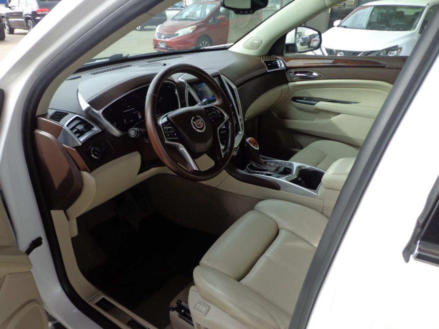 2015 WHITE CADILLAC SRX PERFORMANCE COLLECTION (3GYFNFE38FS) with an 3.6L engine, Automatic transmission, located at 6610 L St., Omaha, NE, 68117, (402) 731-7800, 41.212872, -96.014702 - THIS VEHICLE HAS A BEEN FULLY INSPECTED AND HAS A CLEAN TITLE WITH A FREE CARFAX REPORT PROVIDED! *****We have found that most customers do the majority of their shopping online before visiting a ealership. For this reason we feel it necessary to have a competitive price on our used vehicles rig - Photo#12