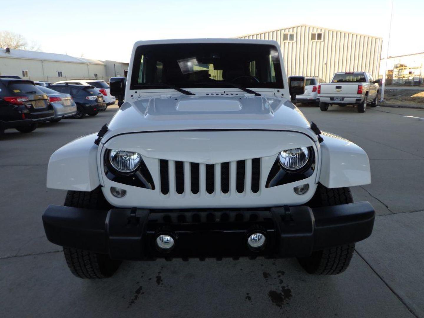 2015 WHITE JEEP WRANGLER UNLIMI SAHARA (1C4BJWEG9FL) with an 3.6L engine, Automatic transmission, located at 6610 L St., Omaha, NE, 68117, (402) 731-7800, 41.212872, -96.014702 - THIS VEHICLE HAS A BEEN FULLY INSPECTED AND HAS A CLEAN TITLE WITH A FREE CARFAX REPORT PROVIDED! 1-OWNER, CLEAN CARFAX, LOW MILEAGE, ALTITUDE PACKAGE WITH SOME NICE ADDED FEATURES AND NEWER TIRES! *****We have found that most customers do the majority of their shopping online before visiting a - Photo#1