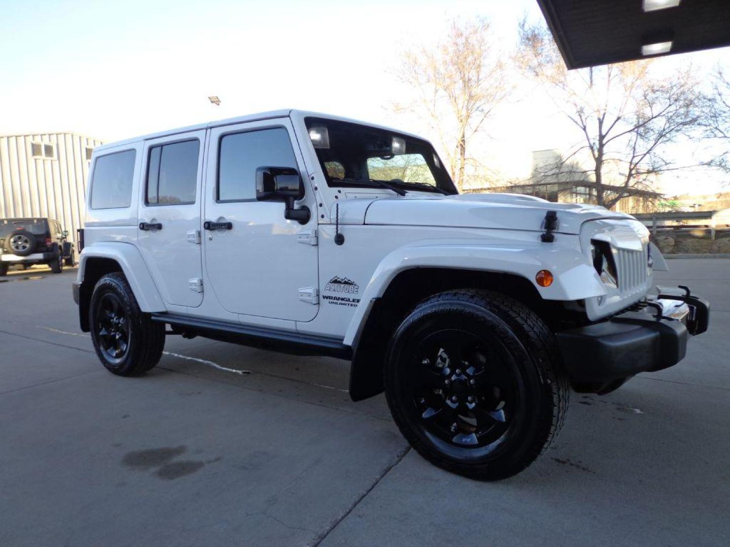 2015 WHITE JEEP WRANGLER UNLIMI SAHARA (1C4BJWEG9FL) with an 3.6L engine, Automatic transmission, located at 6610 L St., Omaha, NE, 68117, (402) 731-7800, 41.212872, -96.014702 - THIS VEHICLE HAS A BEEN FULLY INSPECTED AND HAS A CLEAN TITLE WITH A FREE CARFAX REPORT PROVIDED! 1-OWNER, CLEAN CARFAX, LOW MILEAGE, ALTITUDE PACKAGE WITH SOME NICE ADDED FEATURES AND NEWER TIRES! *****We have found that most customers do the majority of their shopping online before visiting a - Photo#2
