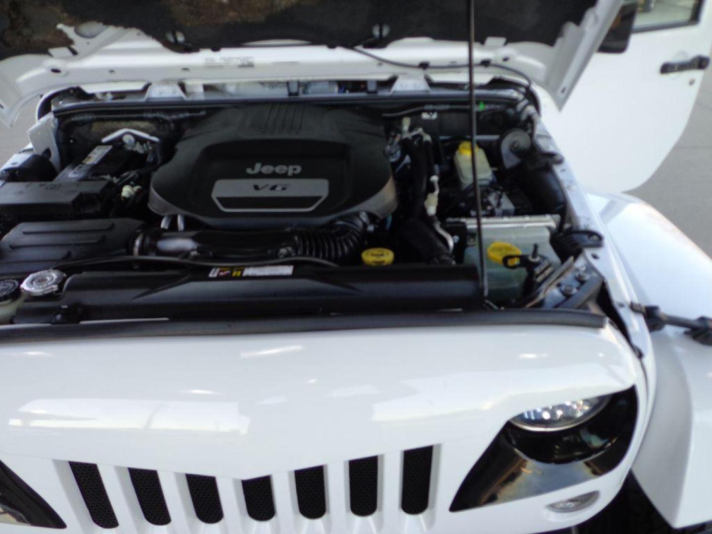 2015 WHITE JEEP WRANGLER UNLIMI SAHARA (1C4BJWEG9FL) with an 3.6L engine, Automatic transmission, located at 6610 L St., Omaha, NE, 68117, (402) 731-7800, 41.212872, -96.014702 - THIS VEHICLE HAS A BEEN FULLY INSPECTED AND HAS A CLEAN TITLE WITH A FREE CARFAX REPORT PROVIDED! 1-OWNER, CLEAN CARFAX, LOW MILEAGE, ALTITUDE PACKAGE WITH SOME NICE ADDED FEATURES AND NEWER TIRES! *****We have found that most customers do the majority of their shopping online before visiting a - Photo#11